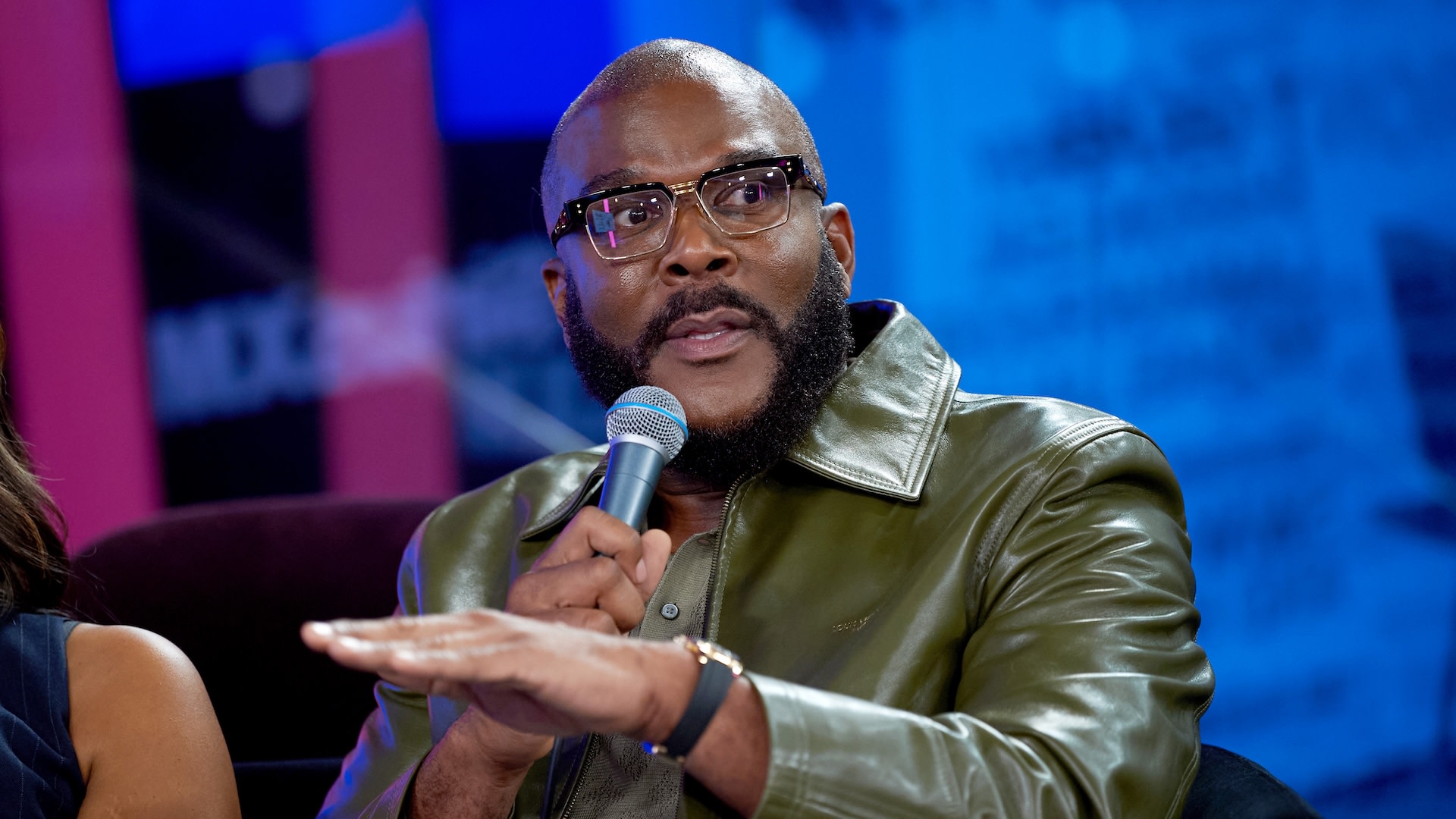 LOS ANGELES, CALIFORNIA - SEPTEMBER 09: Tyler Perry speaks onstage as the cast of "Why Did I Get Married Again?" visit SiriusXM Studios on September 09, 2026 in Los Angeles, California.