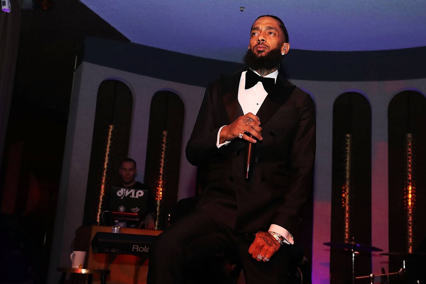 Nipsey Hussle performing on stage during his Victory Lap tour