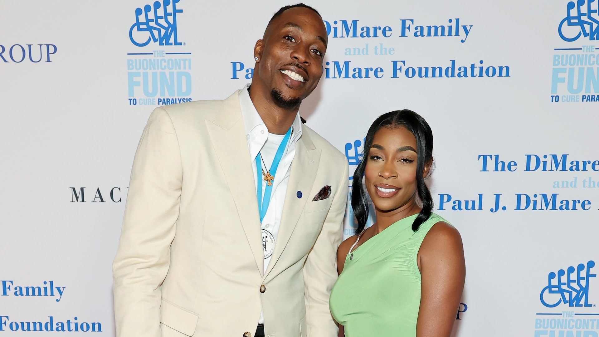 (L-R) Dwight Howard and Amy Luciani.
