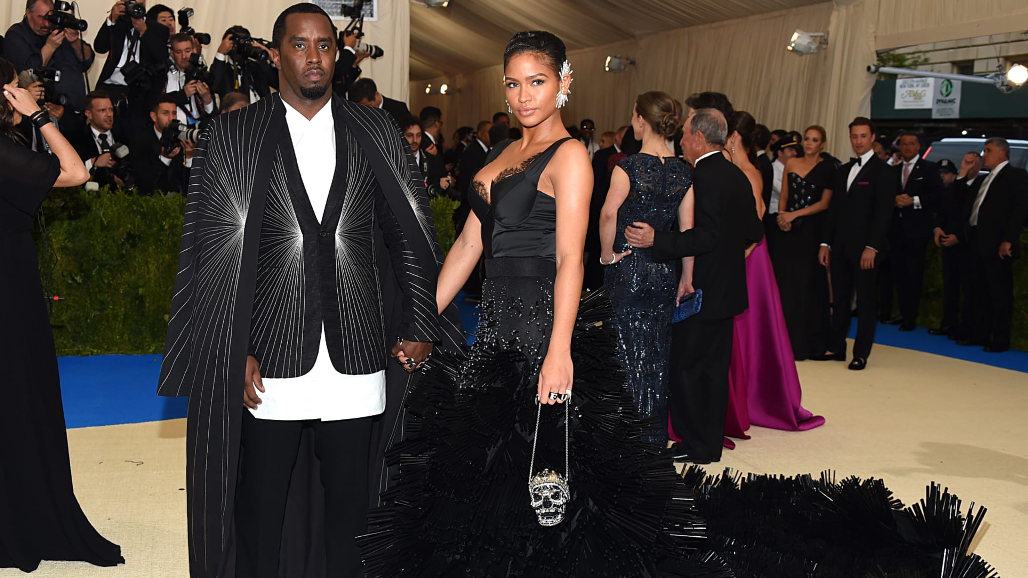 Sean "Diddy" Combs and Cassie Ventura at the Met Gala, wearing coordinated black outfits.