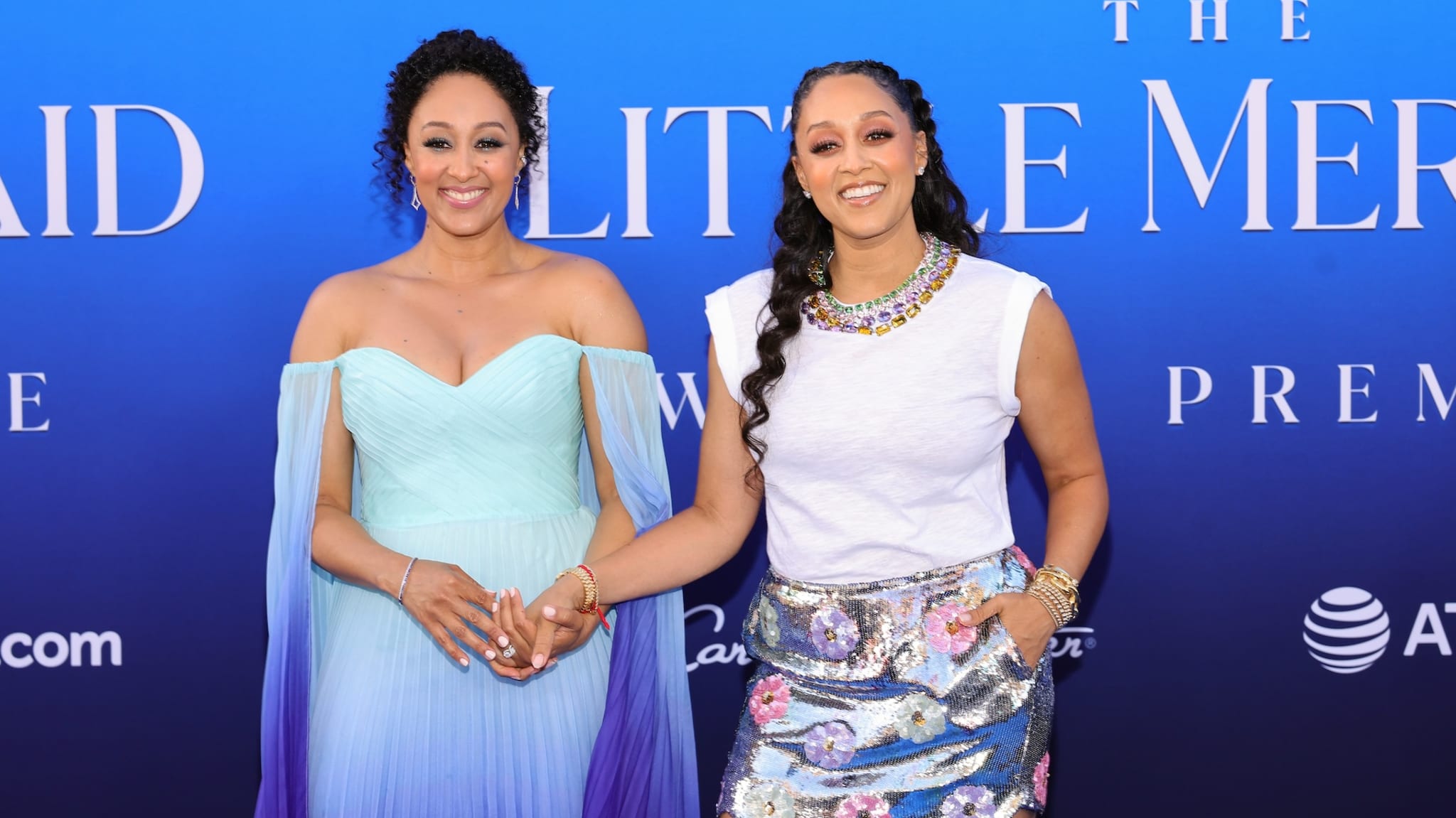 HOLLYWOOD, CALIFORNIA - MAY 08: (L-R) Tamera Mowry-Housley and Tia Mowry attend the world premiere of Disney's "The Little Mermaid" on May 08, 2023 in Hollywood, California.