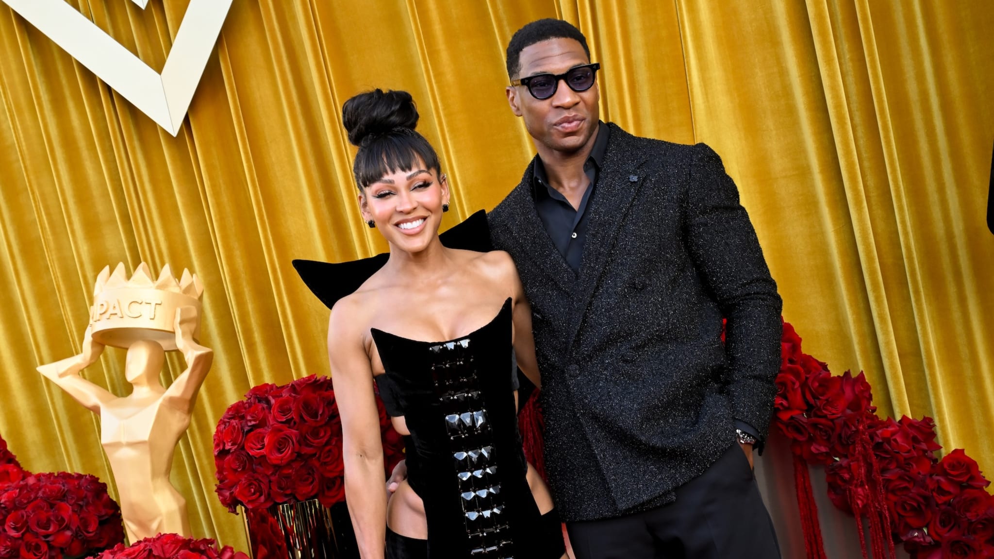 Meagan Good, Jonathan Majors at the fifth annual Hollywood Unlocked Impact Awards held at The Beverly Hilton on June 20, 2025 in Beverly Hills, California.