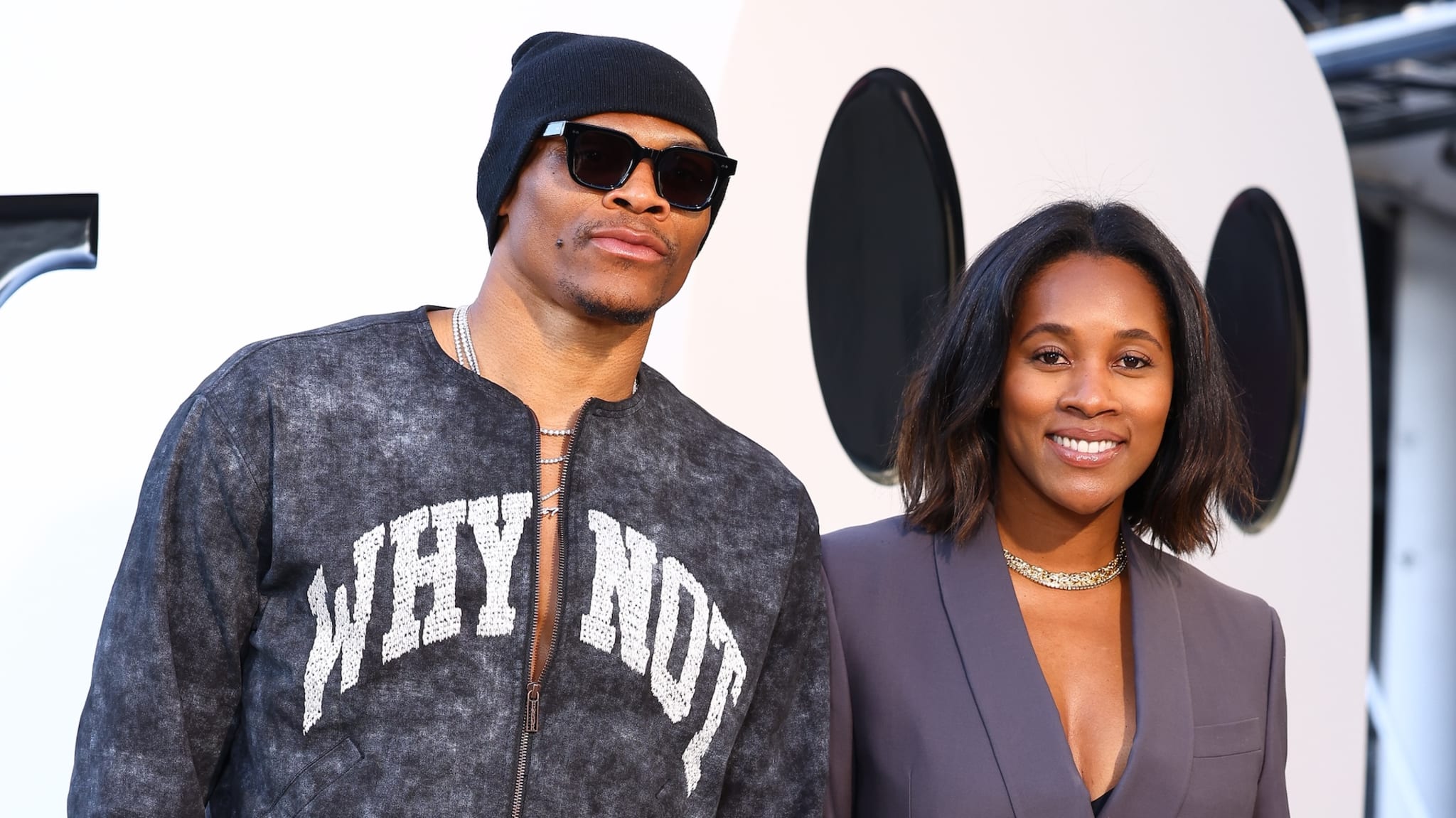 Russell Westbrook and Nina Westbrook attend the Louis Vuitton Menswear Spring/Summer 2026 show as part of Paris Fashion Week on June 24, 2025 in Paris, France.
