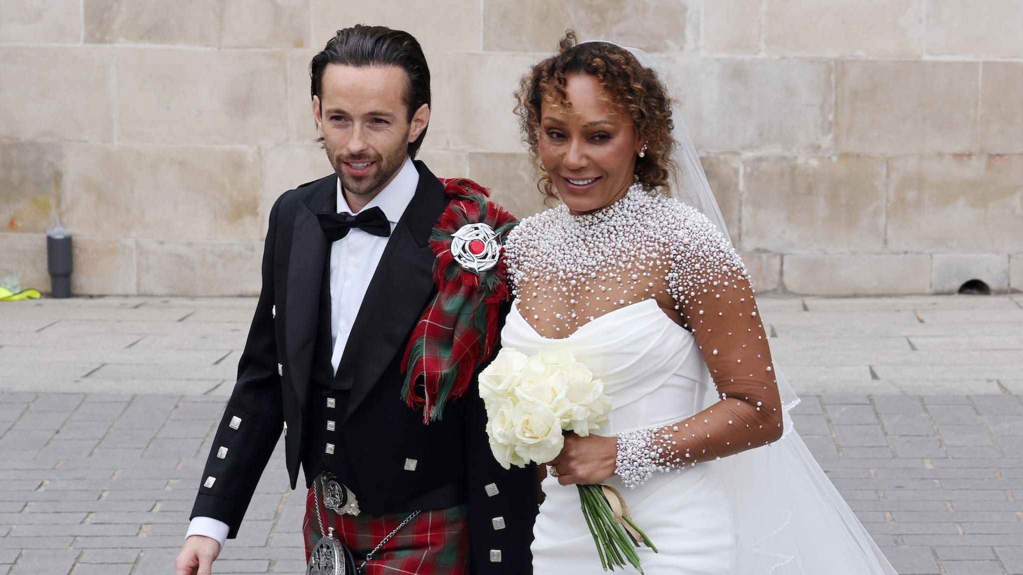 (L-R) Newlyweds Rory McPhee and Mel B.