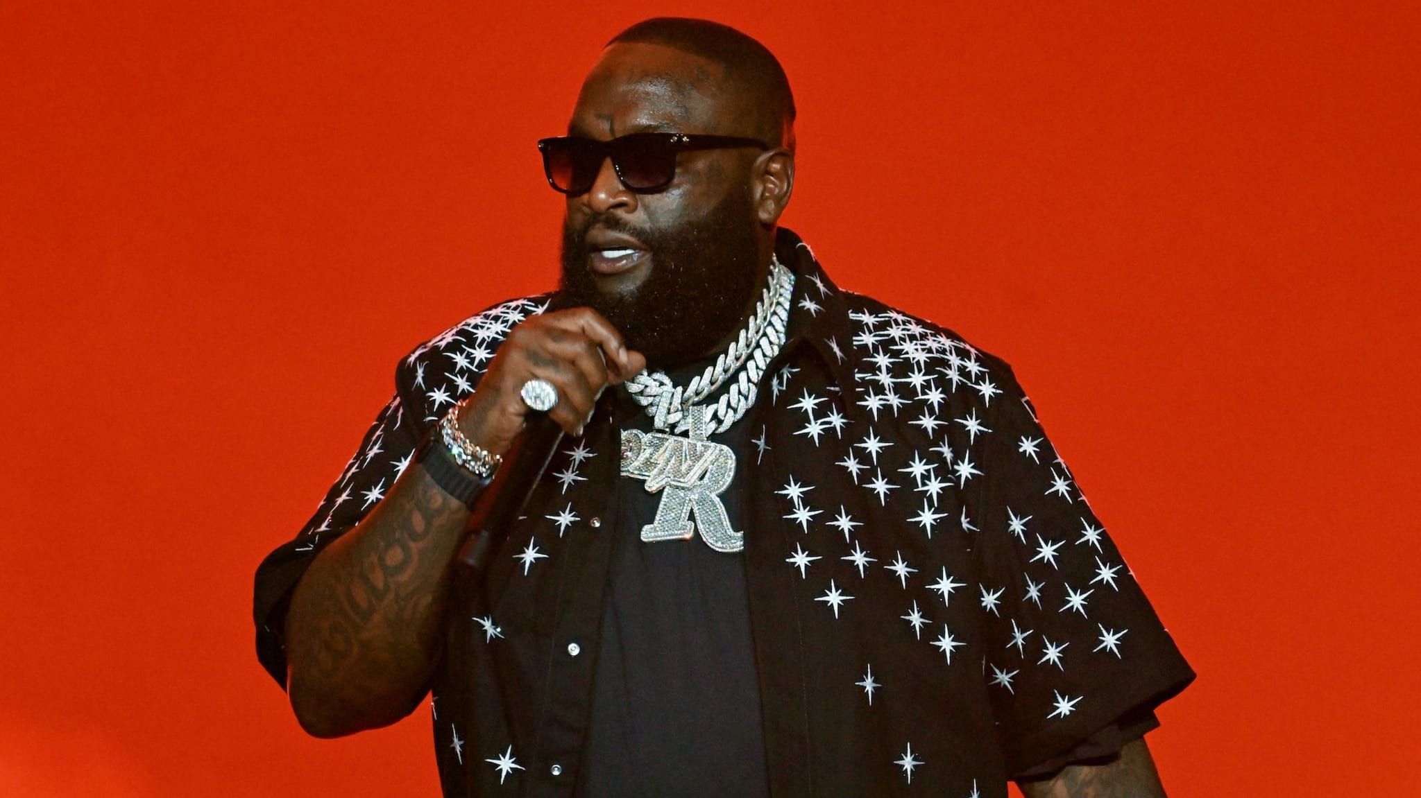 ATLANTA, GEORGIA - AUGUST 23: Rapper Rick Ross performs onstage during YFN Lucci and Friends Welcome Home concert at State Farm Arena on August 23, 2025 in Atlanta, Georgia.
