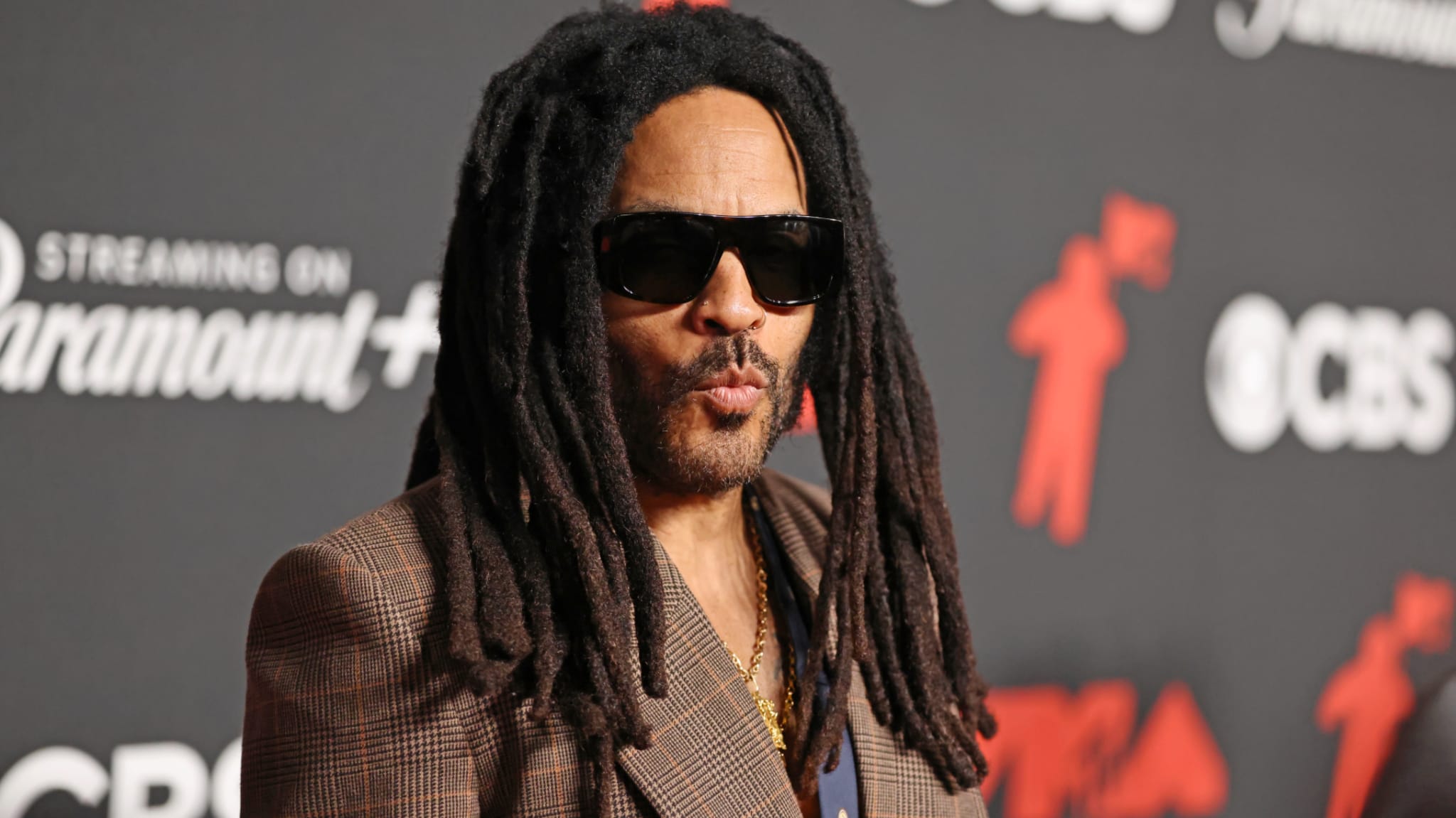 Lenny Kravitz Recounts Overzealous Fan Ripping Out His Locs at a Concert