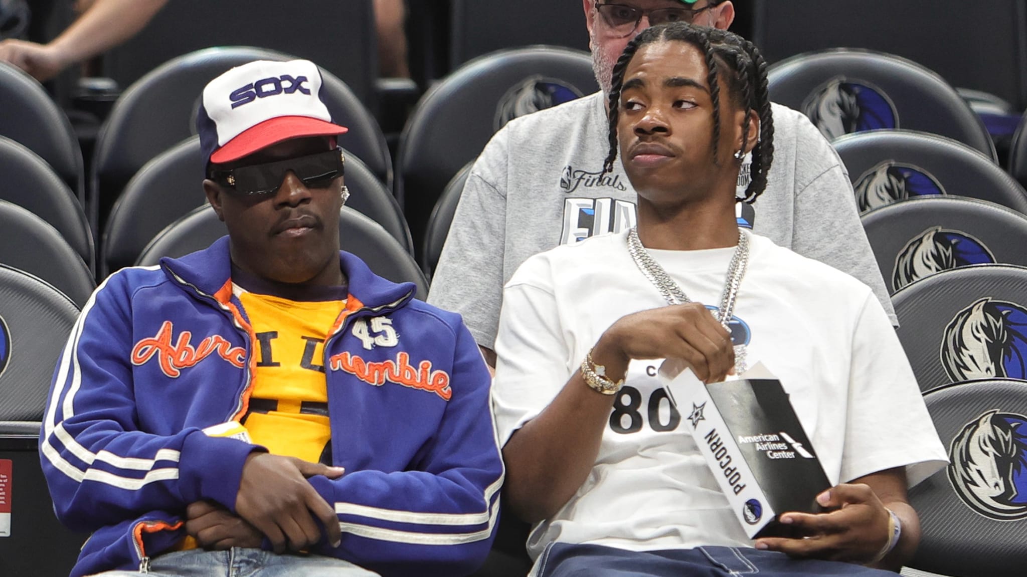Lil Yachty and Camo! attend a game between the San Antonio Spurs and the Dallas Mavericks.