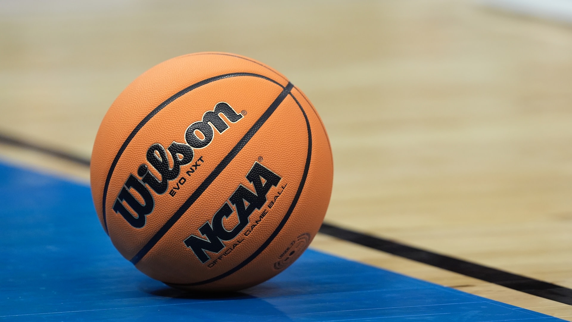 A detailed view of the game ball with the NCAA logo