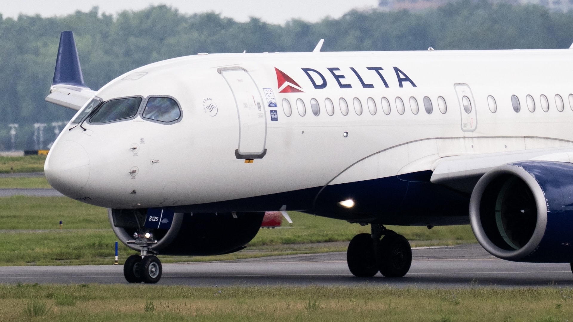 A Delta Air Lines Airbus A220 airplane prepares to takeoff at Ronald Reagan Washington National Airport