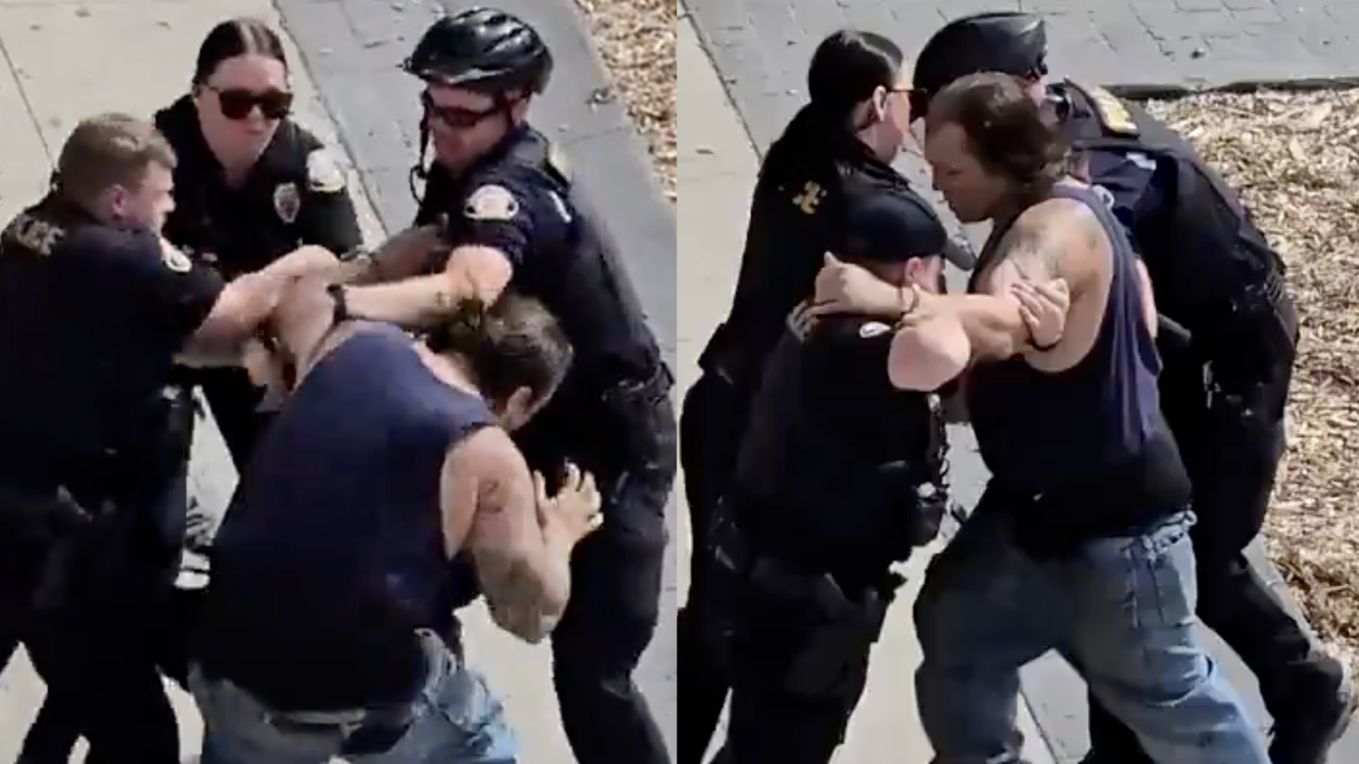 Police officers detaining a man in a blue tank top. The scene is outdoors, with officers in uniform, one wearing a helmet.