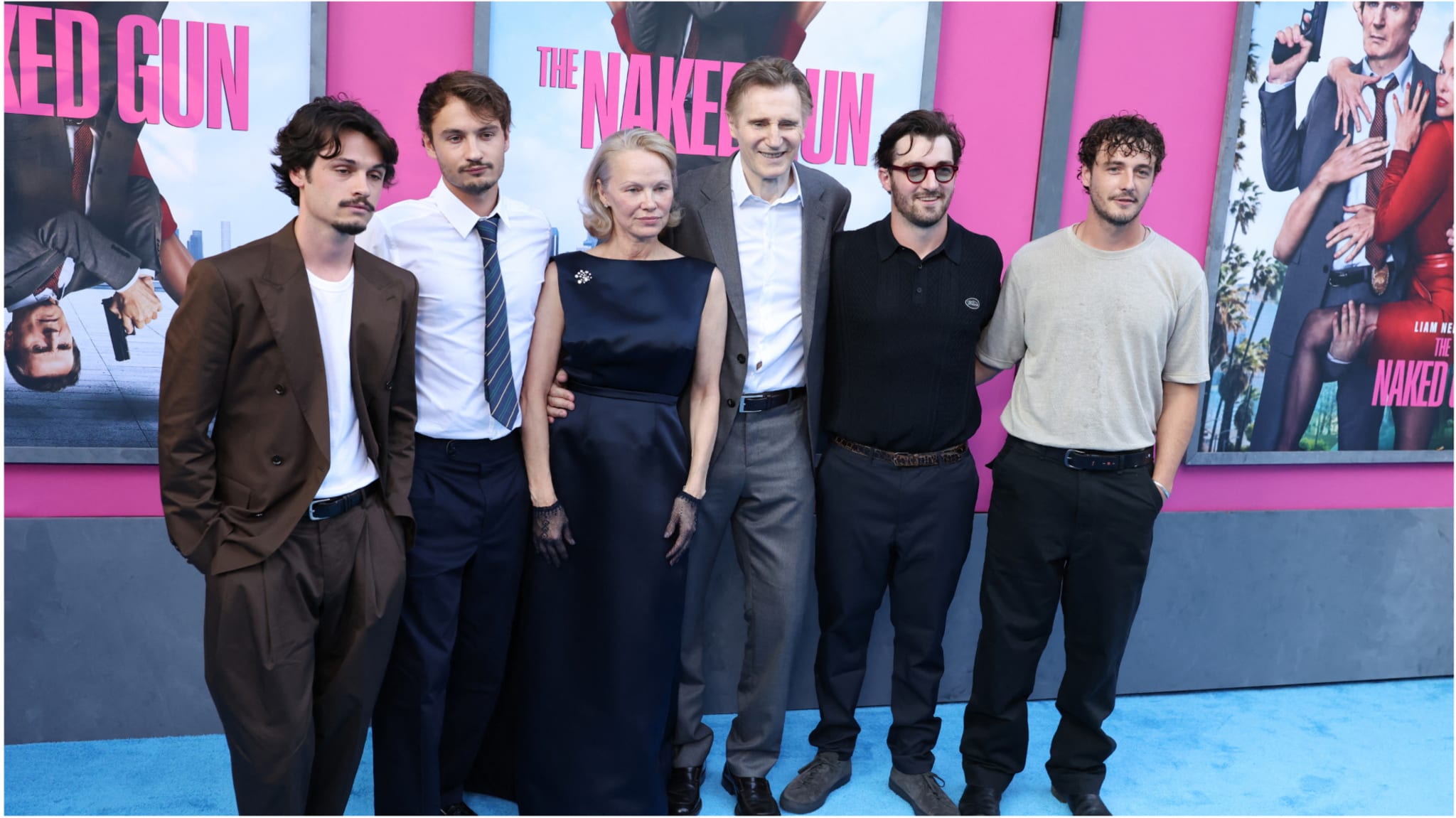 Liam Neeson, Pamela Anderson, and their sons.