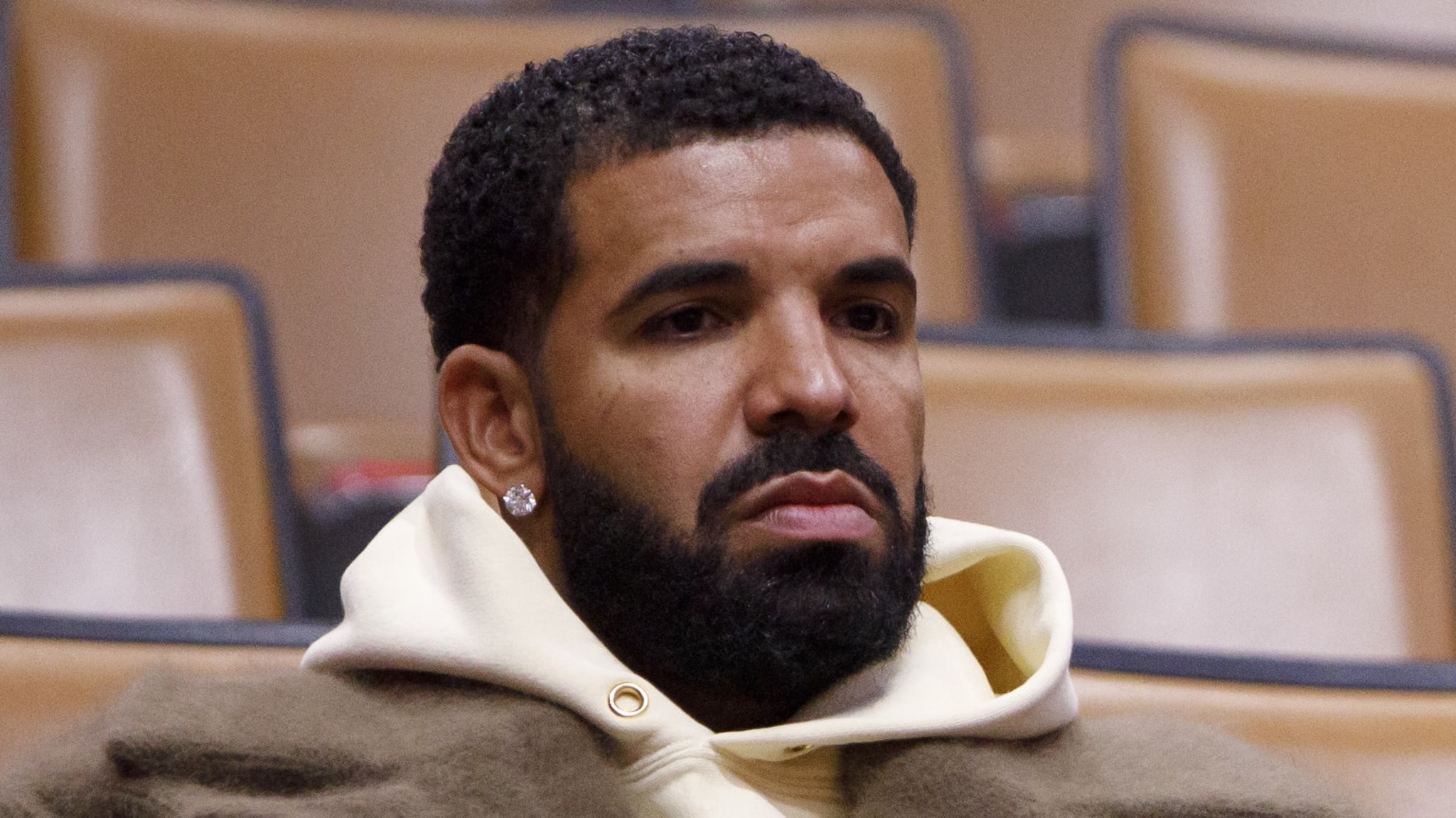 Toronto rapper Drake speaks during the first half of NBA game between the Toronto Raptors and the Miami Heat at Scotiabank Arena on February 1, 2022 in Toronto, Canada.