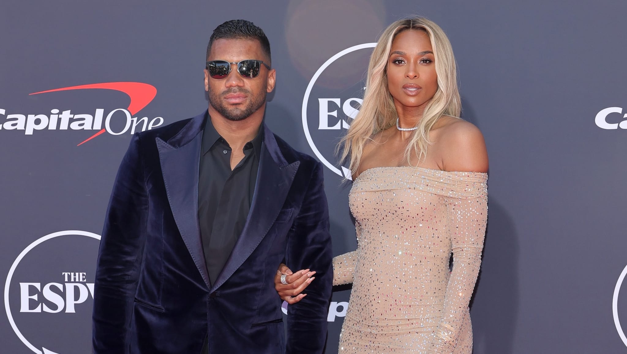 (L-R) Russell Wilson and Ciara.