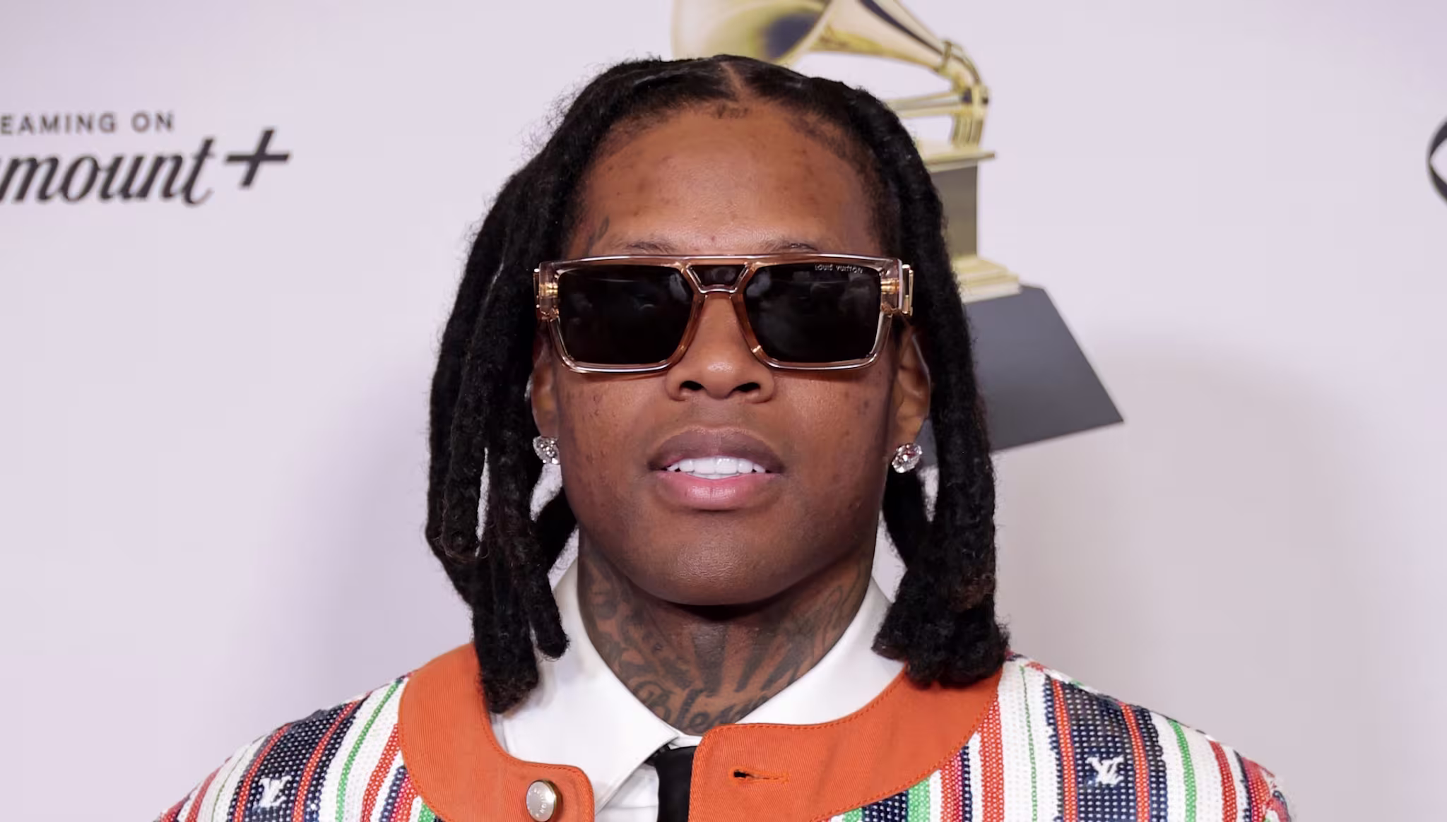 Lil Durk poses in the press room during the 66th GRAMMY Awards.