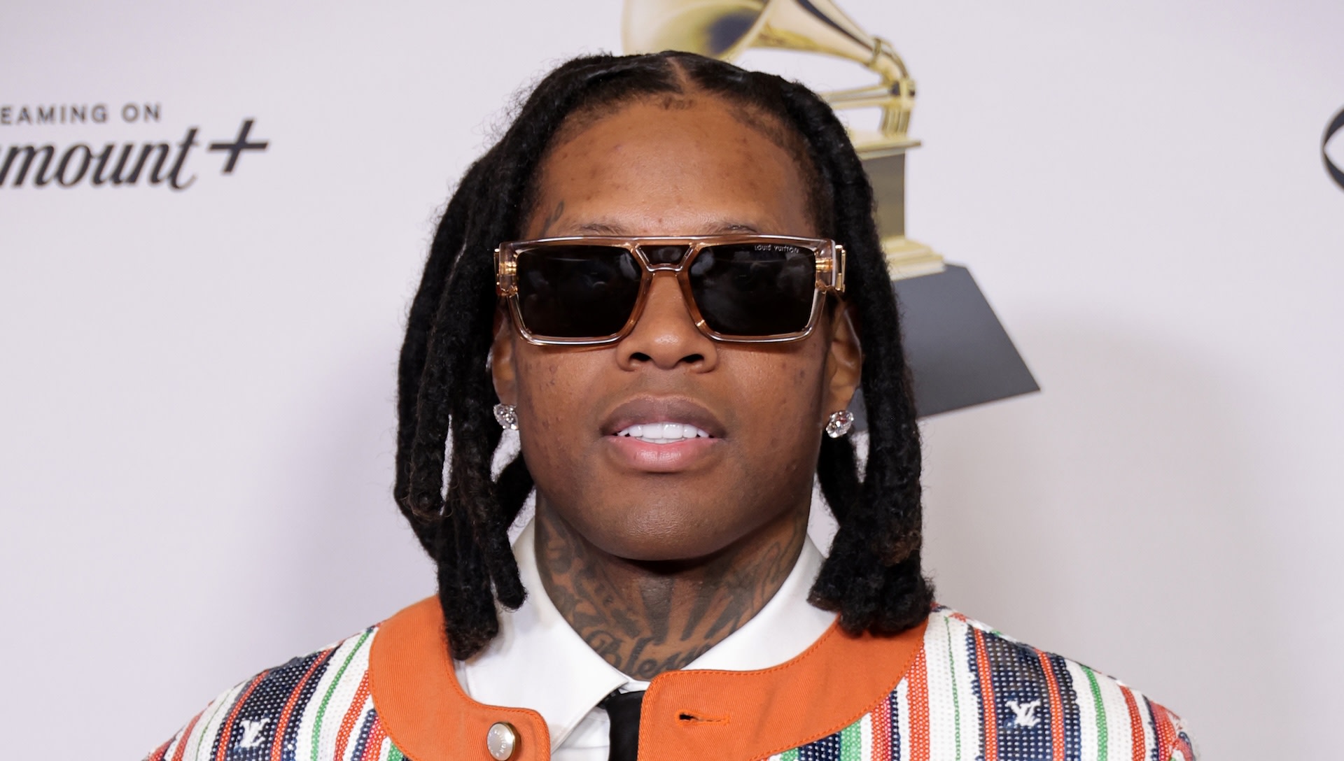 Lil Durk poses in the press room during the 66th GRAMMY Awards.