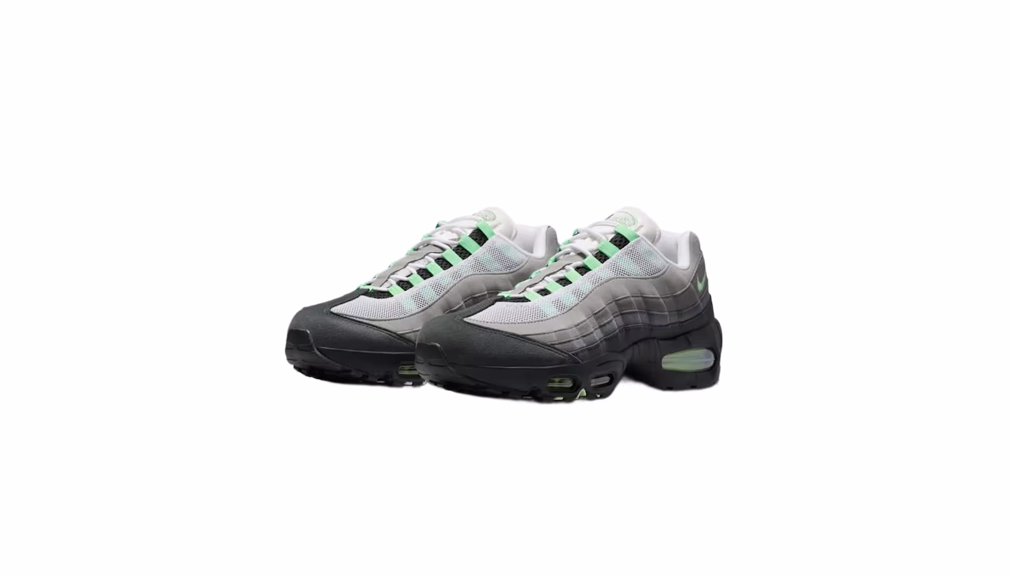 A pair of Nike Air Max 95 sneakers in shades of gray and green, with a visible air unit in the sole.