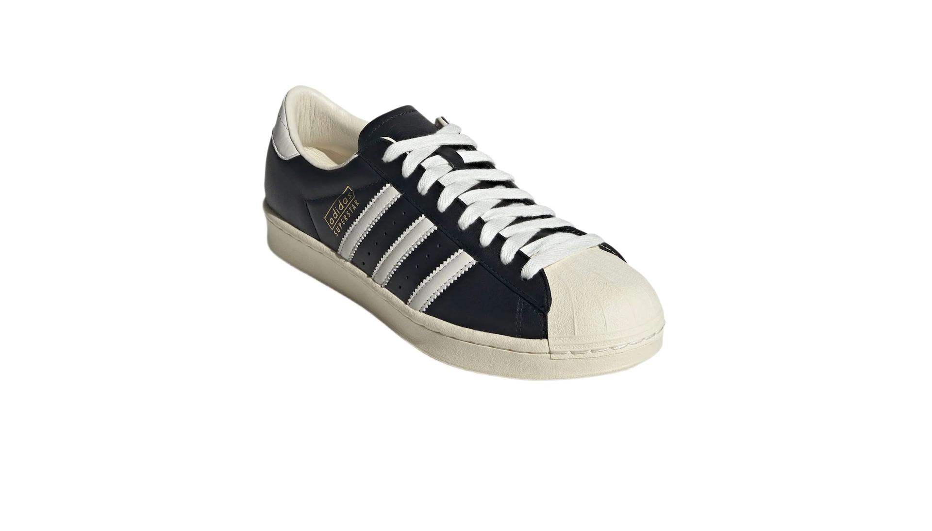 A black and white Adidas Superstar sneaker with three white stripes and a shell toe design.