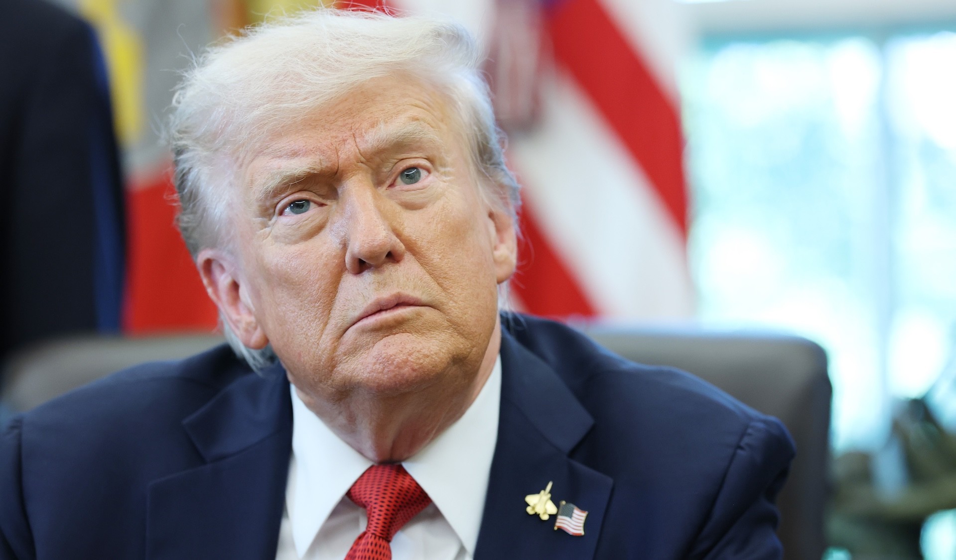 Donald Trump speaks in the Oval Office at the White House.