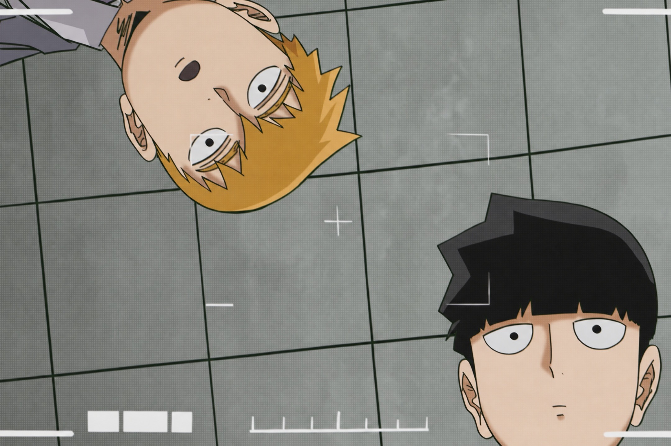 Two animated characters, Reigen Arataka with blond hair and Mob with black hair, are looking down at the viewer, as if from a camera's perspective.