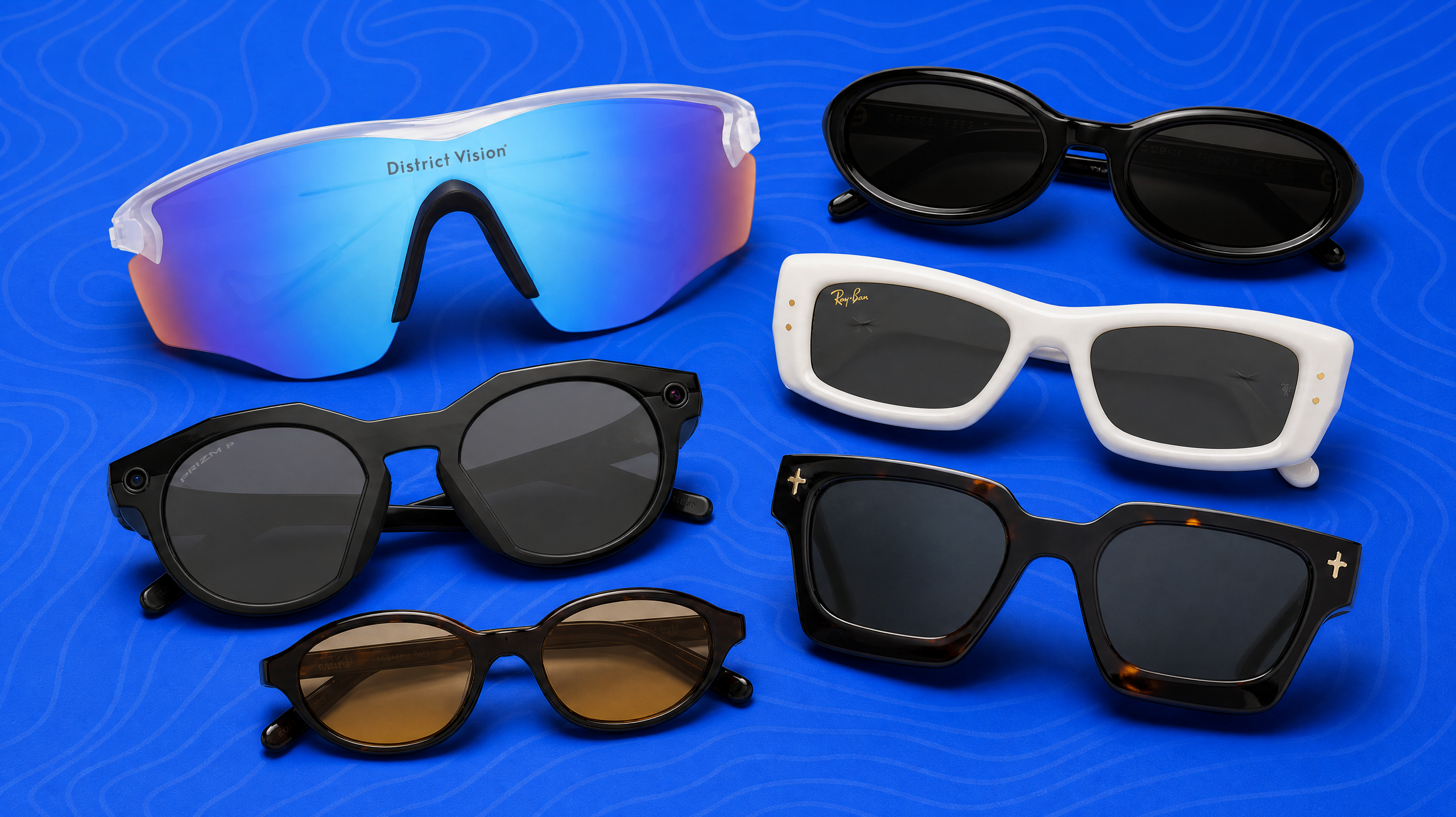 A collection of six sunglasses on a blue background, including brands like District Vision and Ray-Ban. Various shapes and colors are displayed.