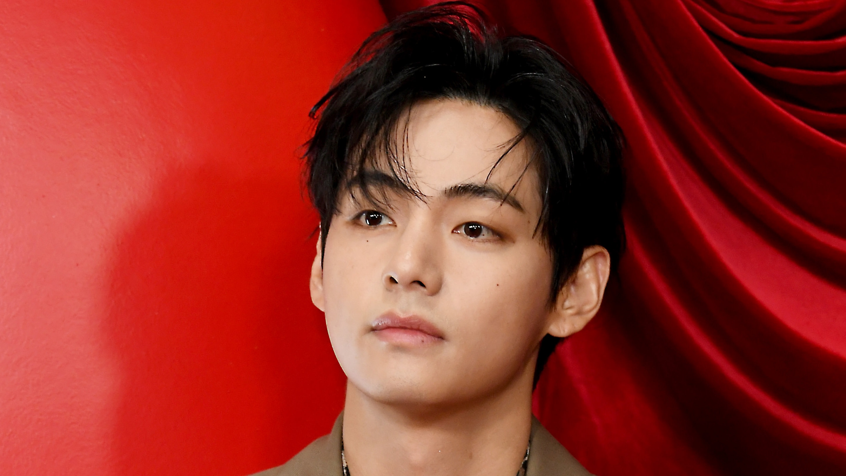 Kim Tae-Hyung, also known as V of BTS, celebrates TIRTIR's "Radiate In Red" Campaign on November 14, 2025 in Los Angeles, California. 