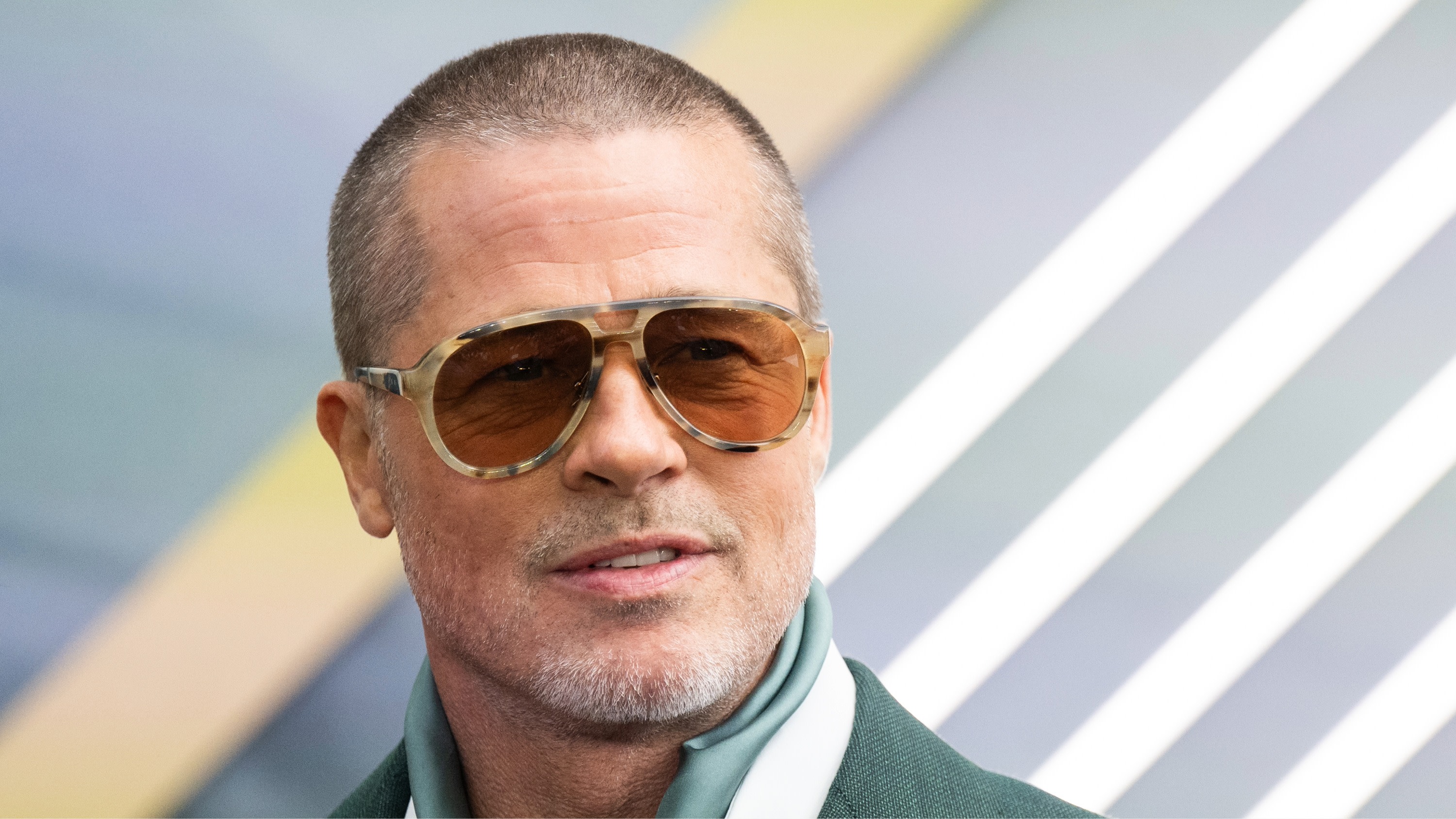 Brad Pitt attends movie premiere.