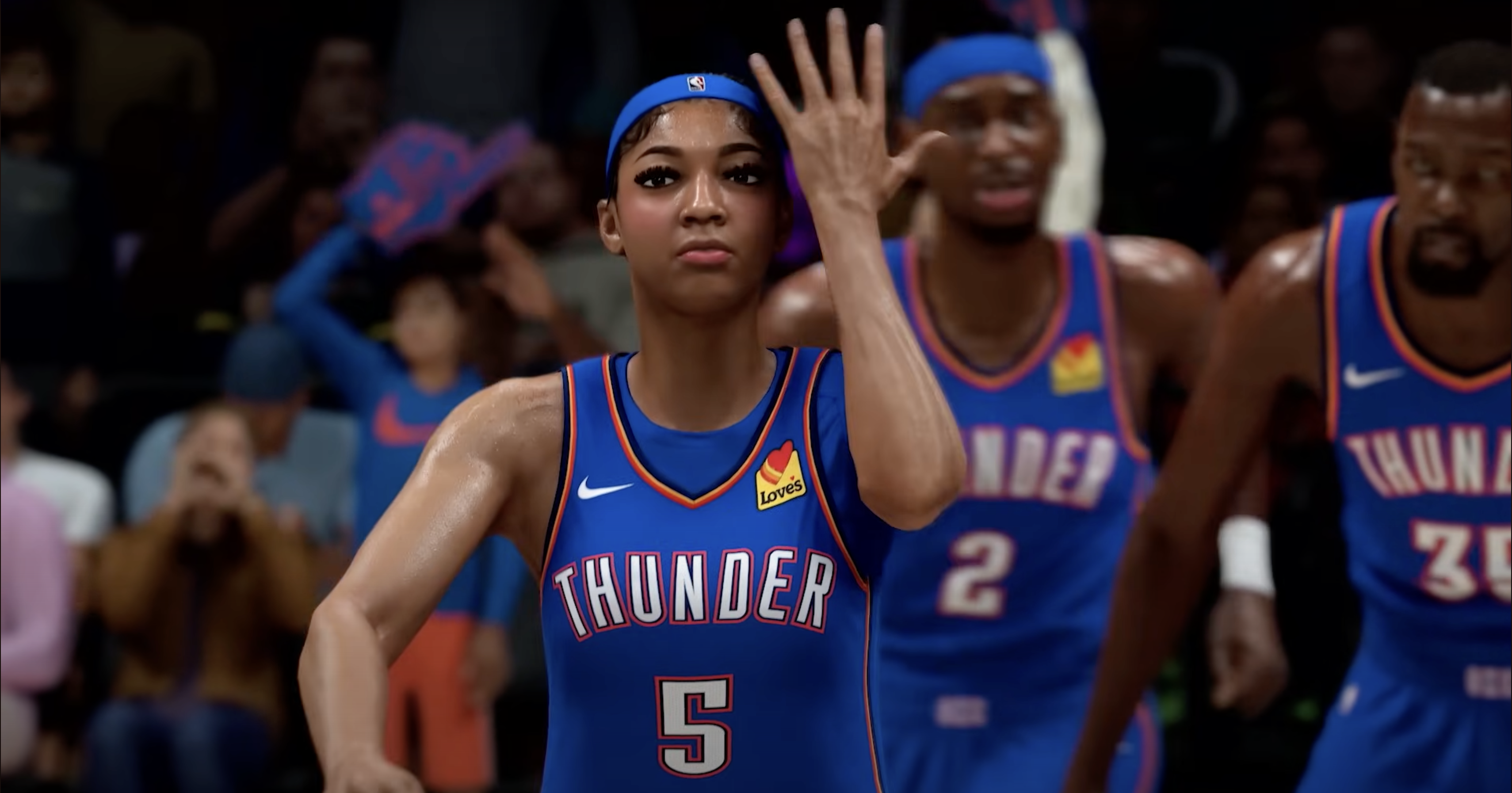 A basketball player in a "Thunder" jersey, number 5, gestures on the court. Two teammates are in the background.