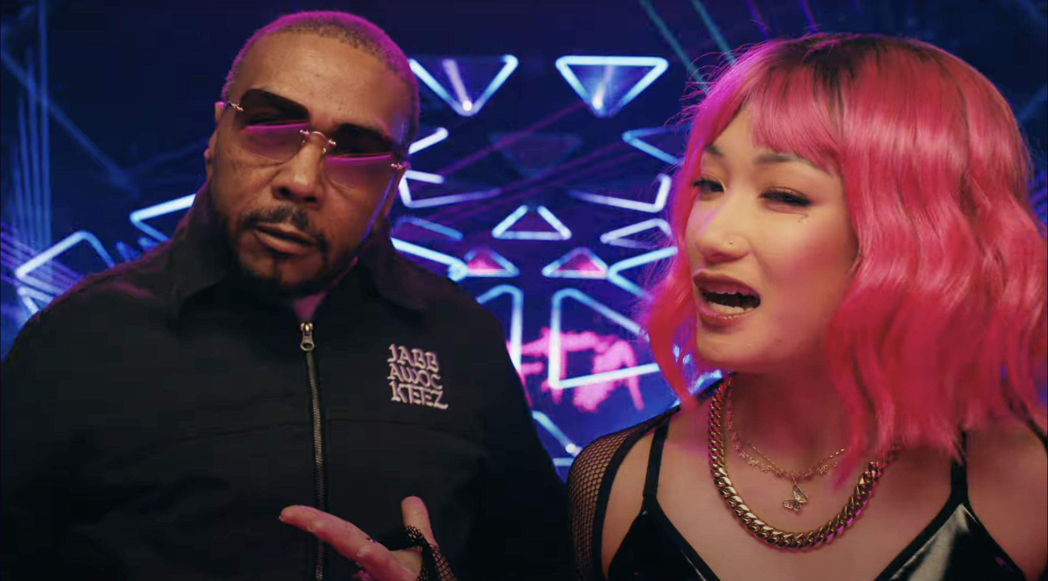 Timbaland and Tata in the music video for "Glitch x Pulse."