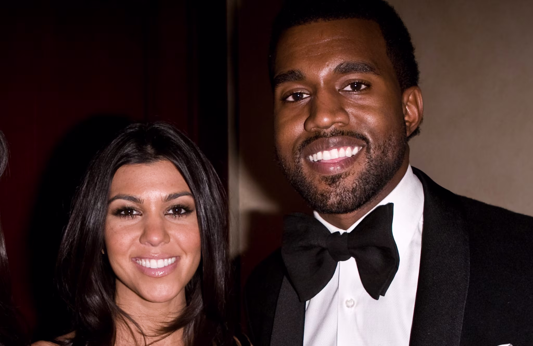 (L-R) Kourtney Kardashian and Kanye West.