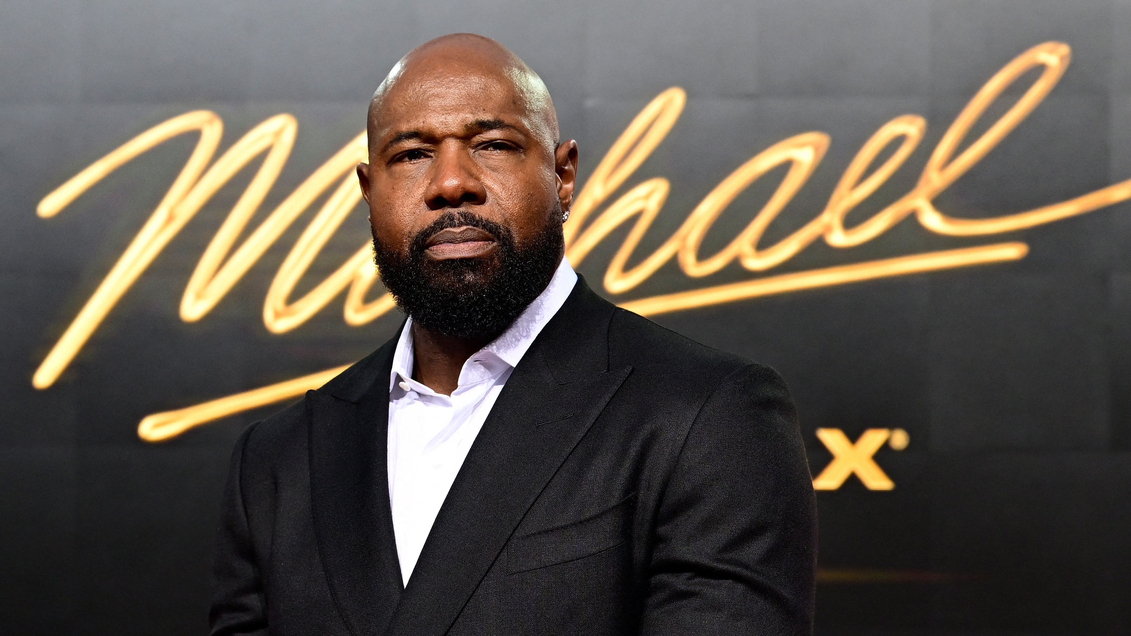 US director Antoine Fuqua poses for photogaphers as he arrives on the red carpet for the world premiere of the Michael Jackson biopic "Michael" at the Uber Eats Music Hall in Berlin on April 10, 2026.