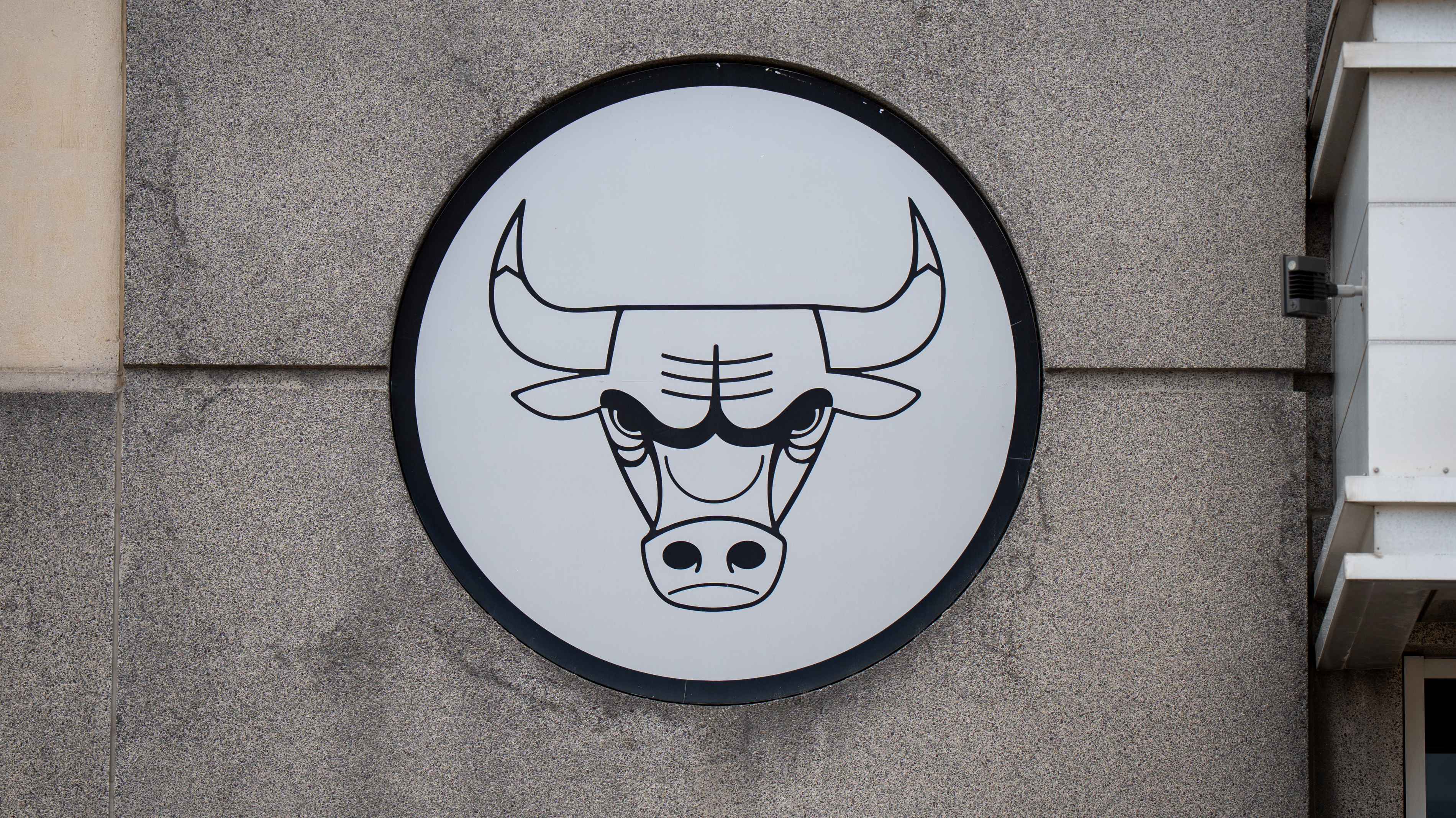 The Chicago Bulls team logo sign is seen on the United Center building in Chicago, Illinois, United States, on July 25, 2026. The bull logotype represents the American professional basketball franchise competing in the NBA National Basketball Association. 