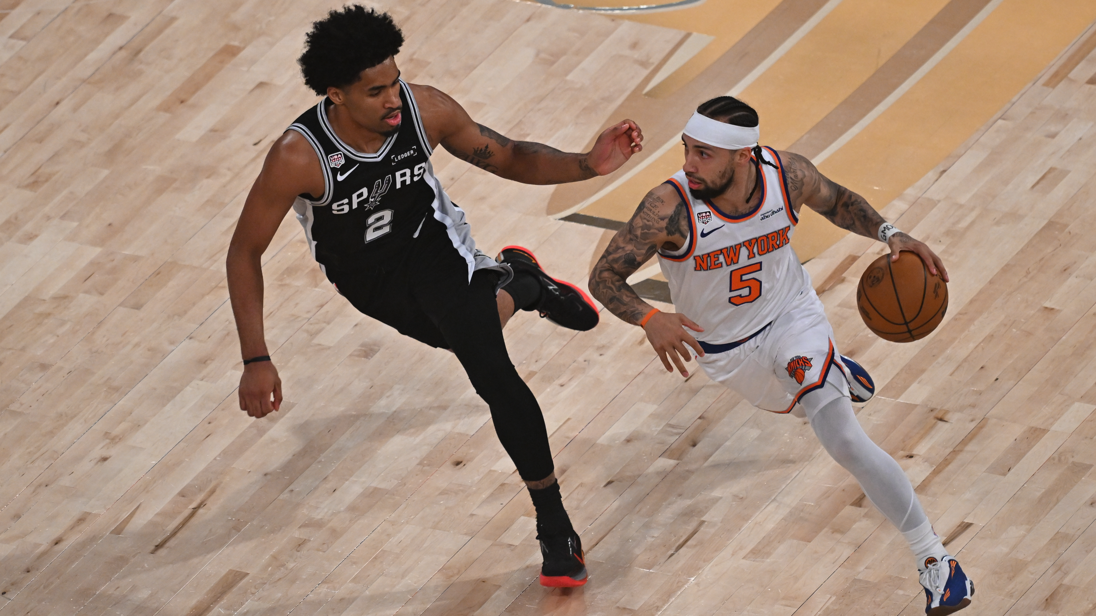 Jose Alvarado (5) of the New York Knicks and Dylan Harper (2) of San Antonio Spurs in action during the National Basketball Association (NBA) finals game between the New York Knicks and San Antonio Spurs at the Madison Square Garden in New York, United States on June 10, 2026.