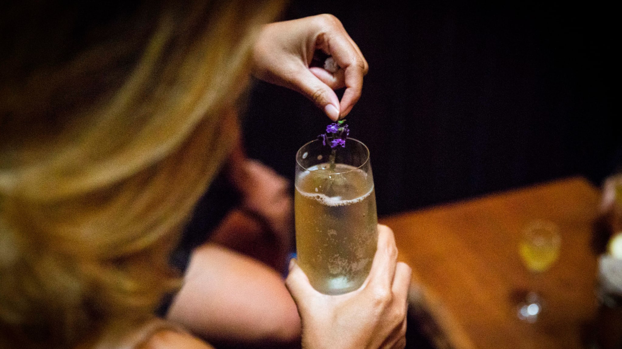 A customer at Teens of Thailand holds a Kratom mocktail on October 17, 2021 in Bangkok, Thailand.