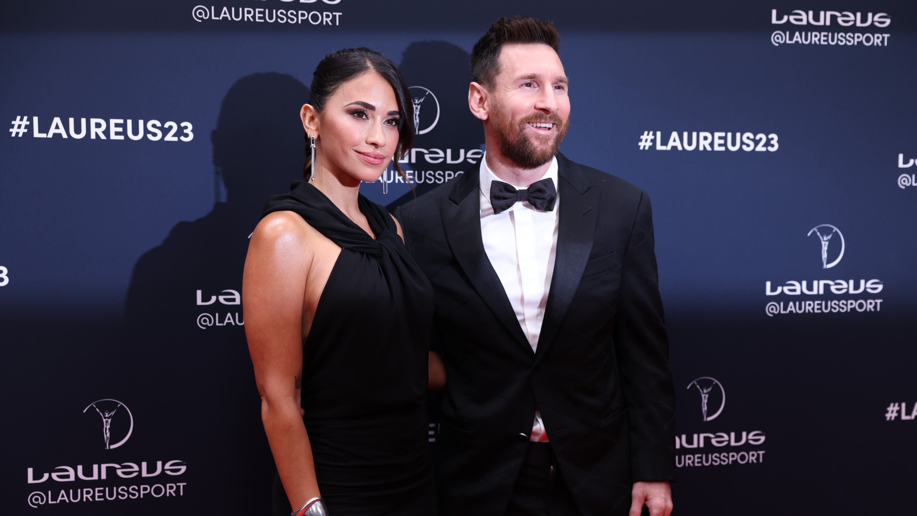 Argentinian football player Lionel Messi R and his wife Antonela Roccuzzo are seen on the red carpet prior to the 2023 Laureus World Sports Awards ceremony.