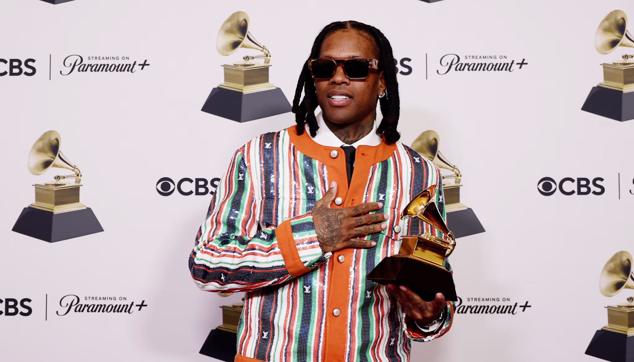 Lil Durk holding his Grammy at the 66th GRAMMY Awards.