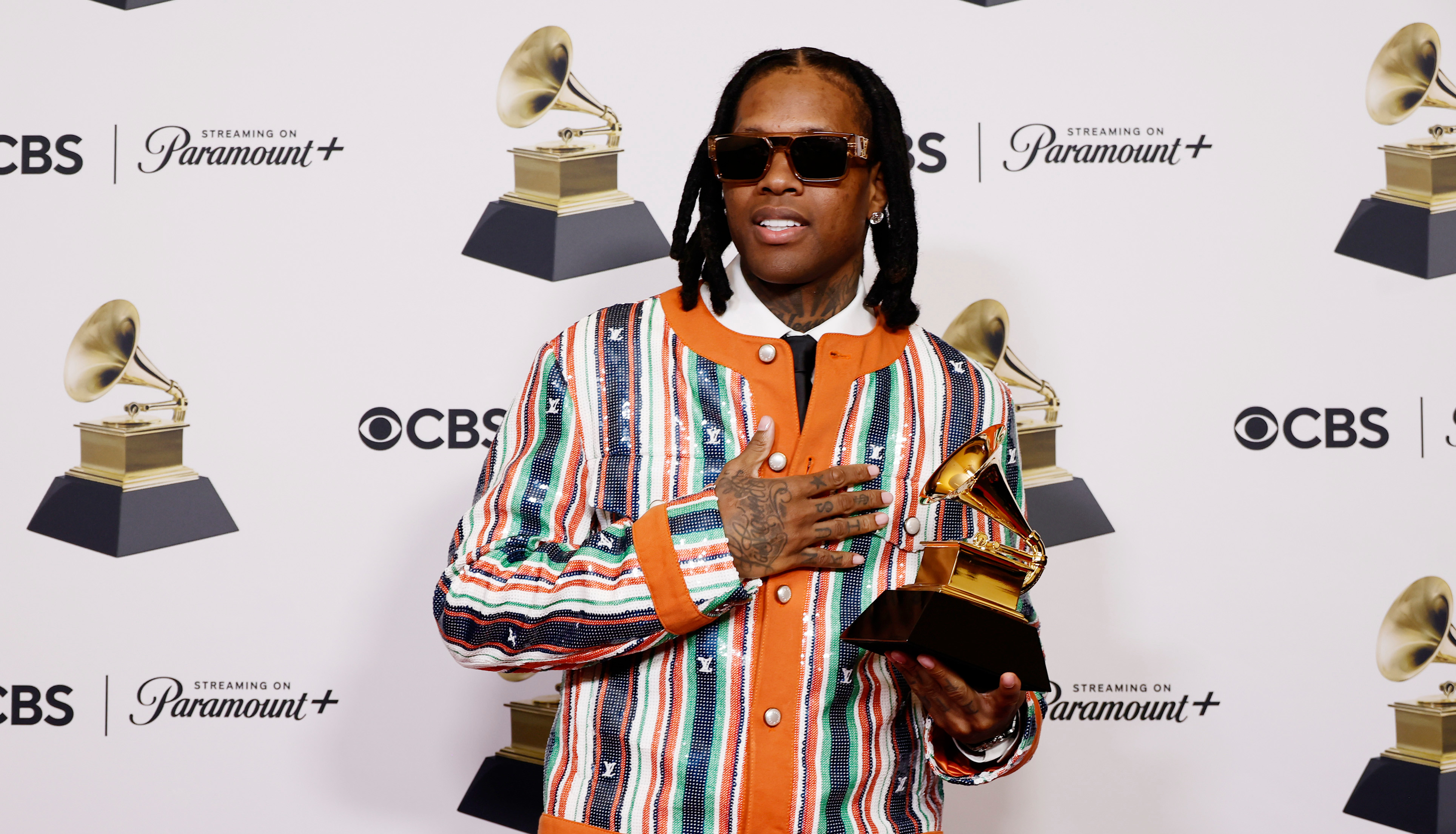 Lil Durk holding his Grammy at the Lil Durk holding his Grammy at the 66th GRAMMY Awards.