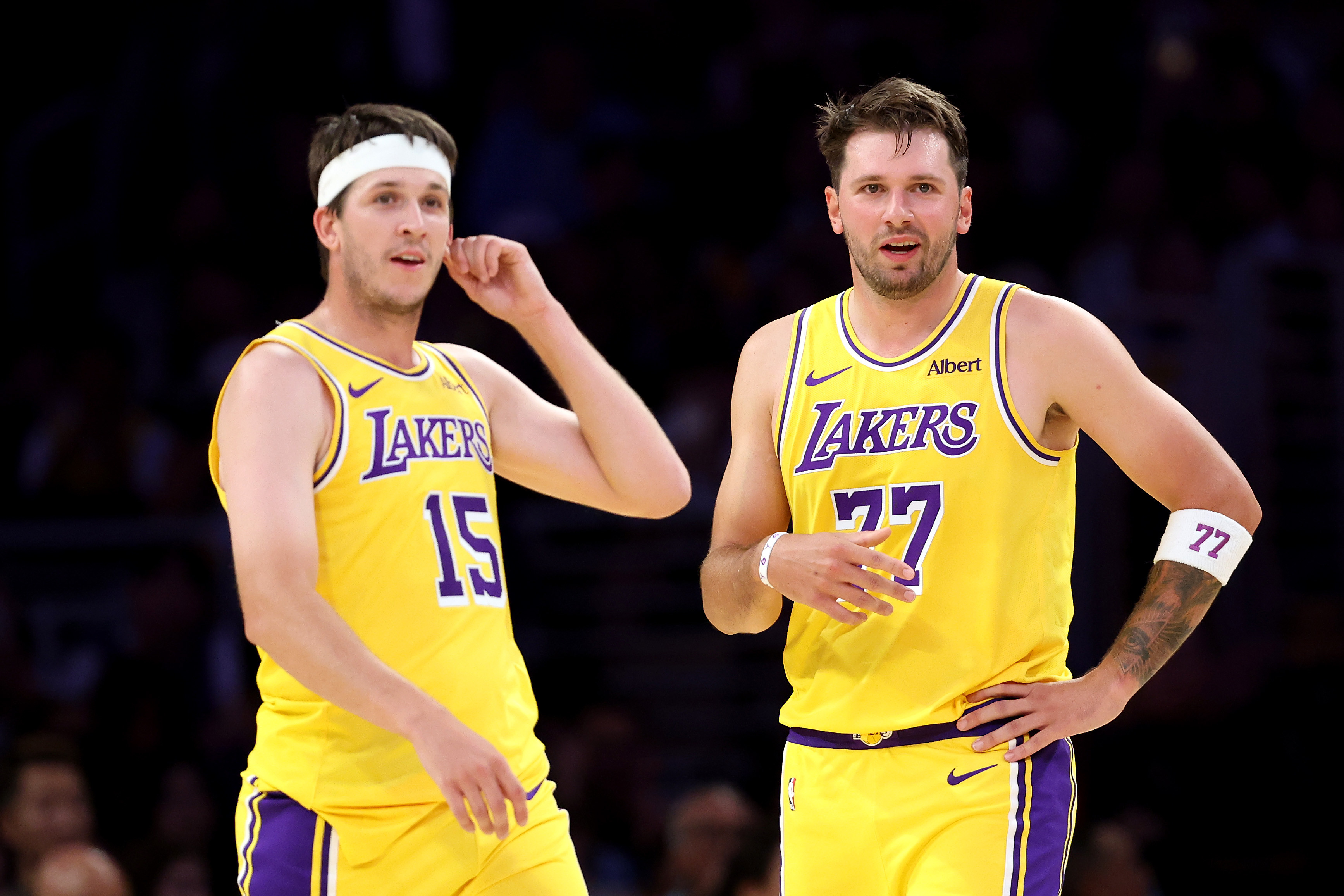 Austin Reaves and Luka Doncic during a Los Angeles Lakers preseason game. 