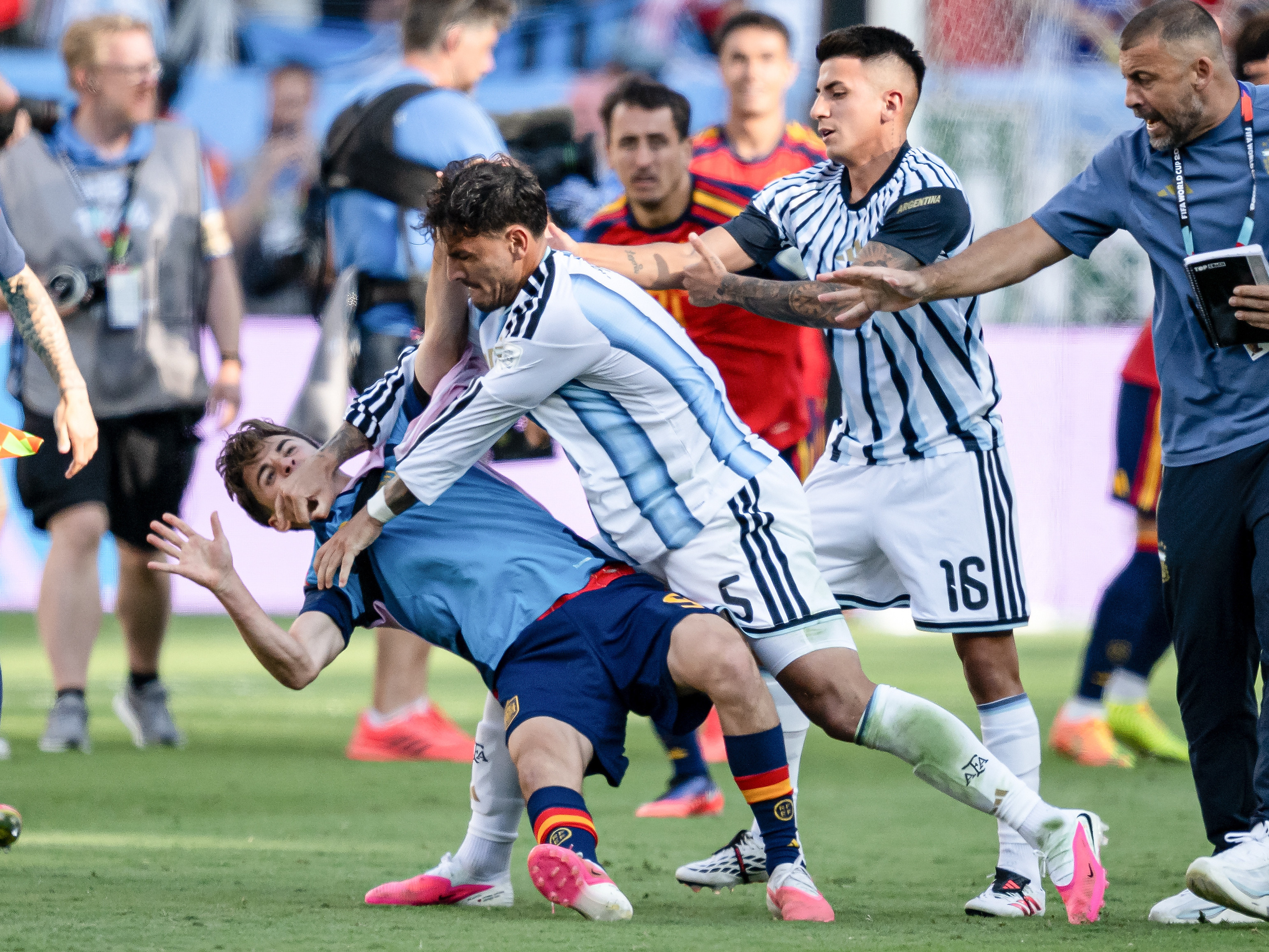 Leandro Paredes of Argentina gets violent with Gavi of Spain.