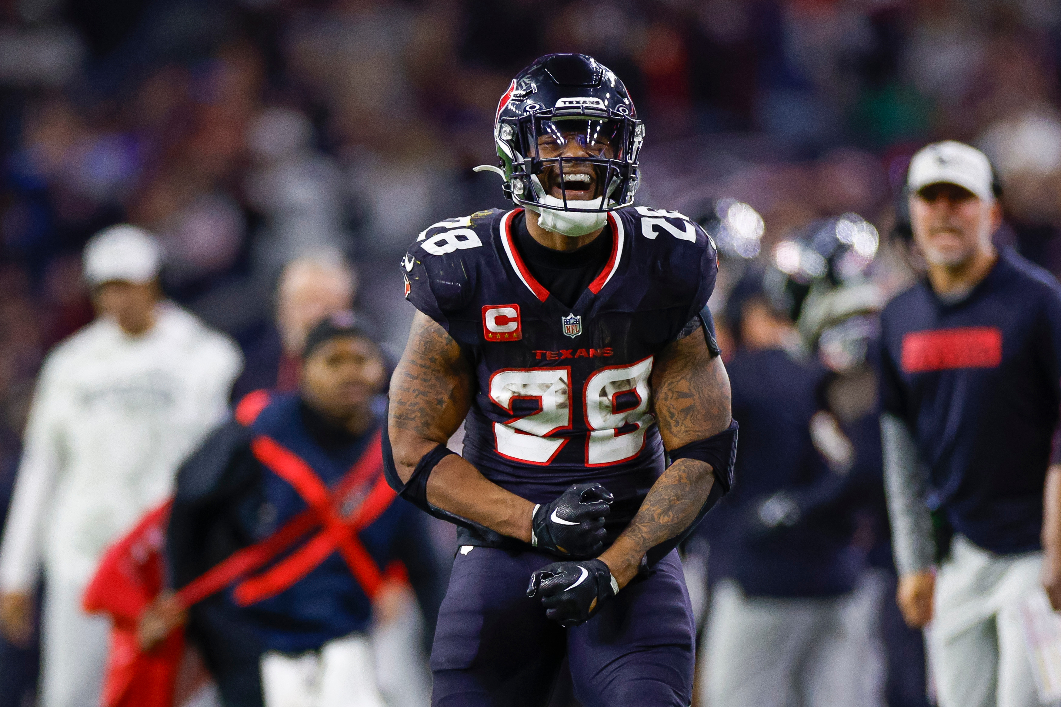 Joe Mixon celebrates during the 2025 AFC Wild Card Game between the Houston Texans and Los Angeles Chargers. 