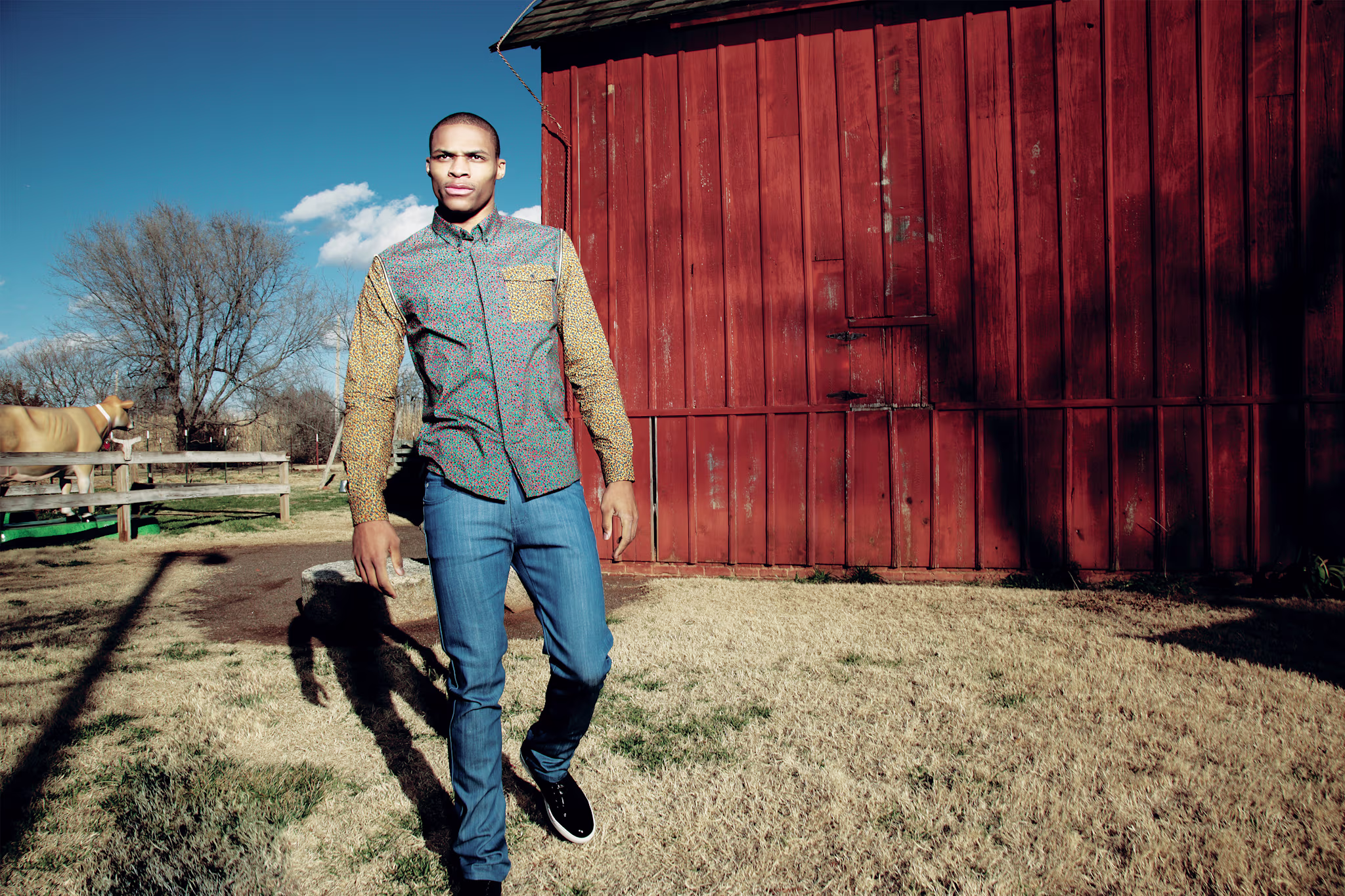 Russell Westbrook walks on a farm during a cover shoot for Complex's April/May 2013. 