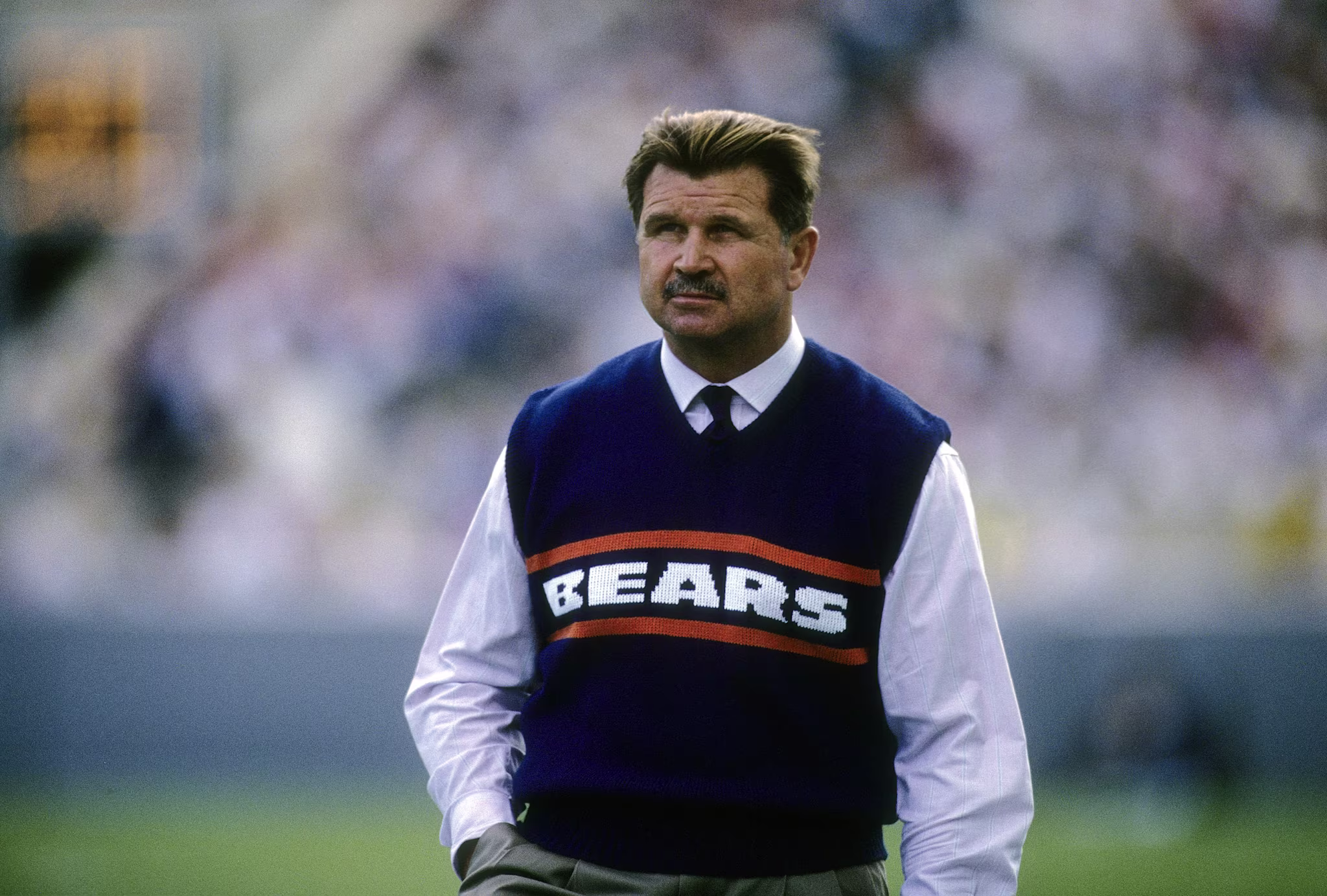 Mike Ditka patrols the sidelines during a Chicago Bears game. 
