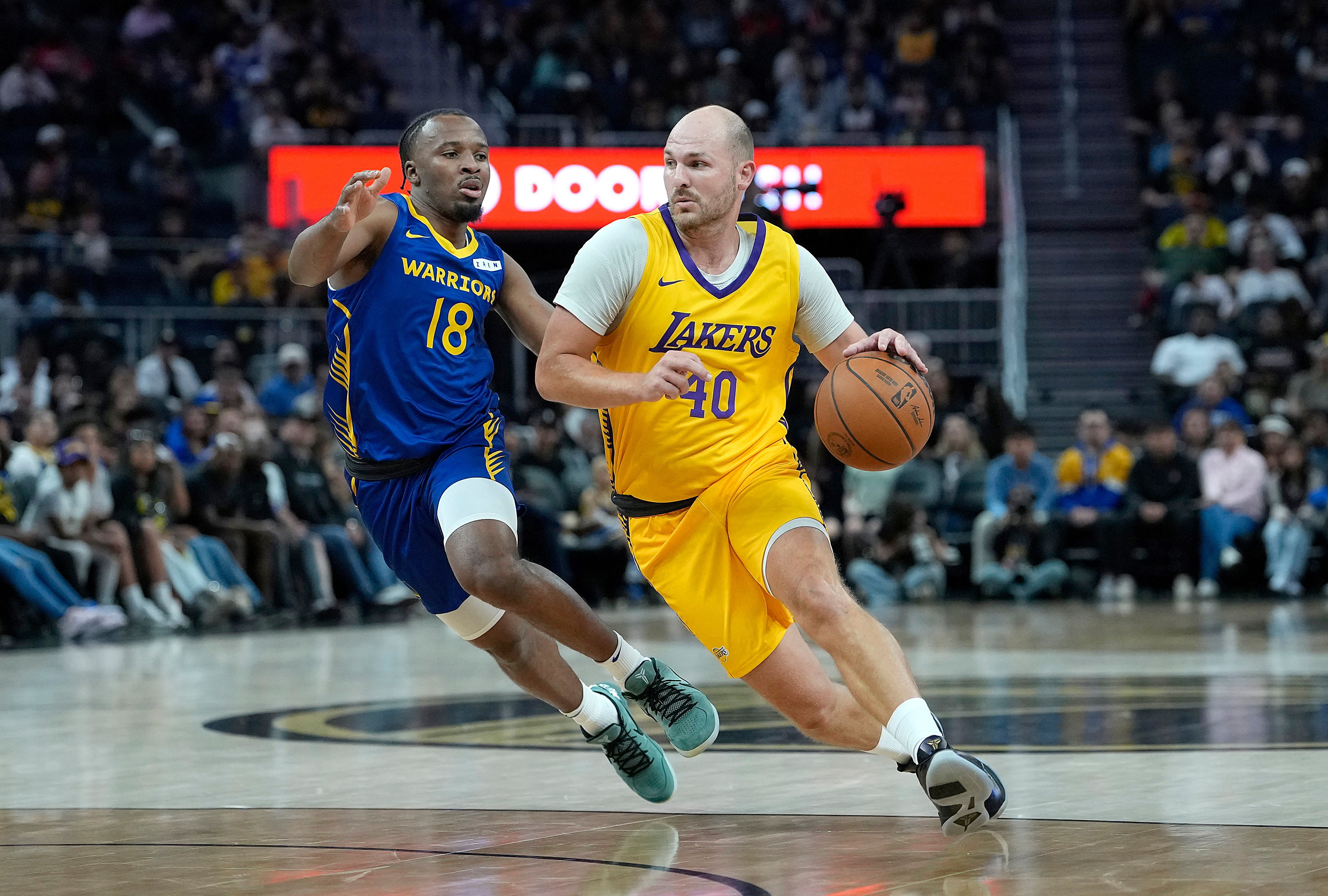 Jon Elmore drives the lane during a Lakers Summer League game in July 2026. 