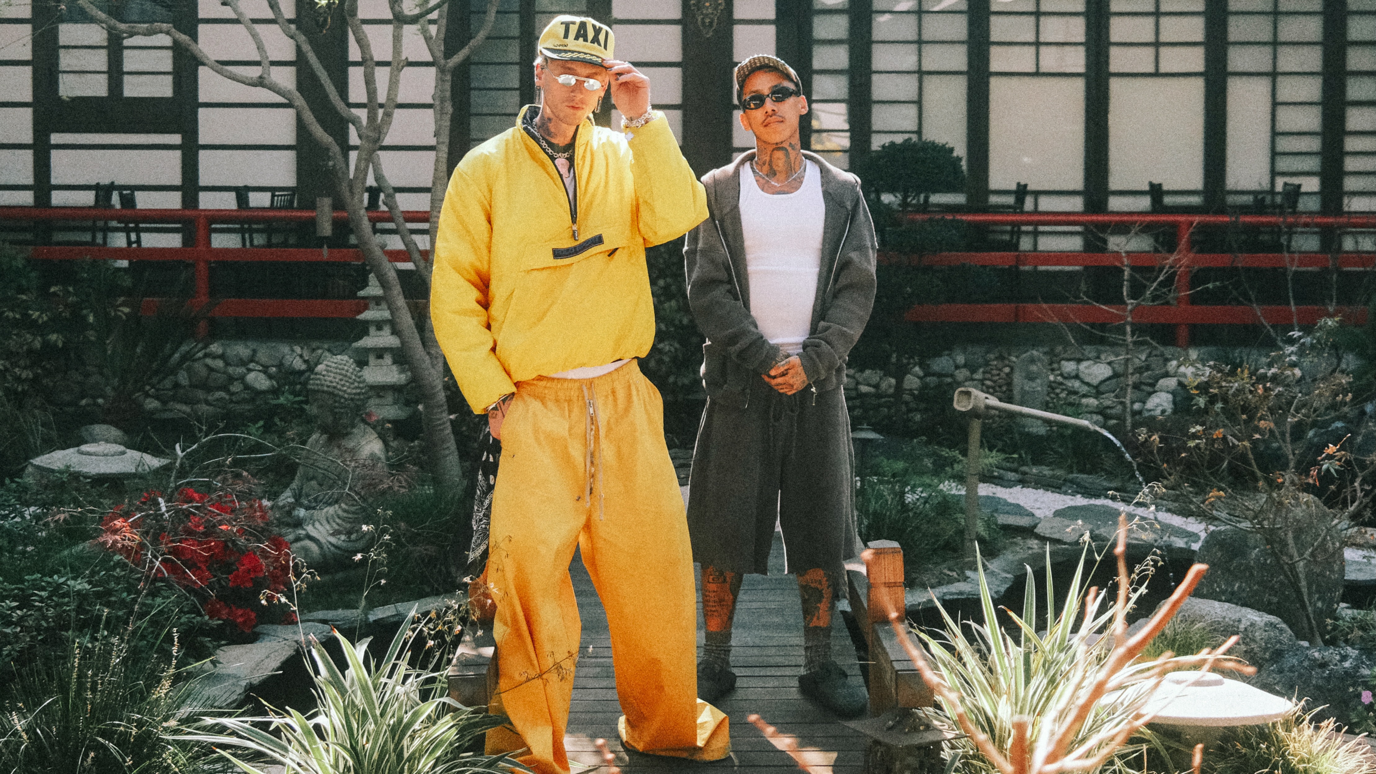 (L-R) MGK and Yuki Chiba.