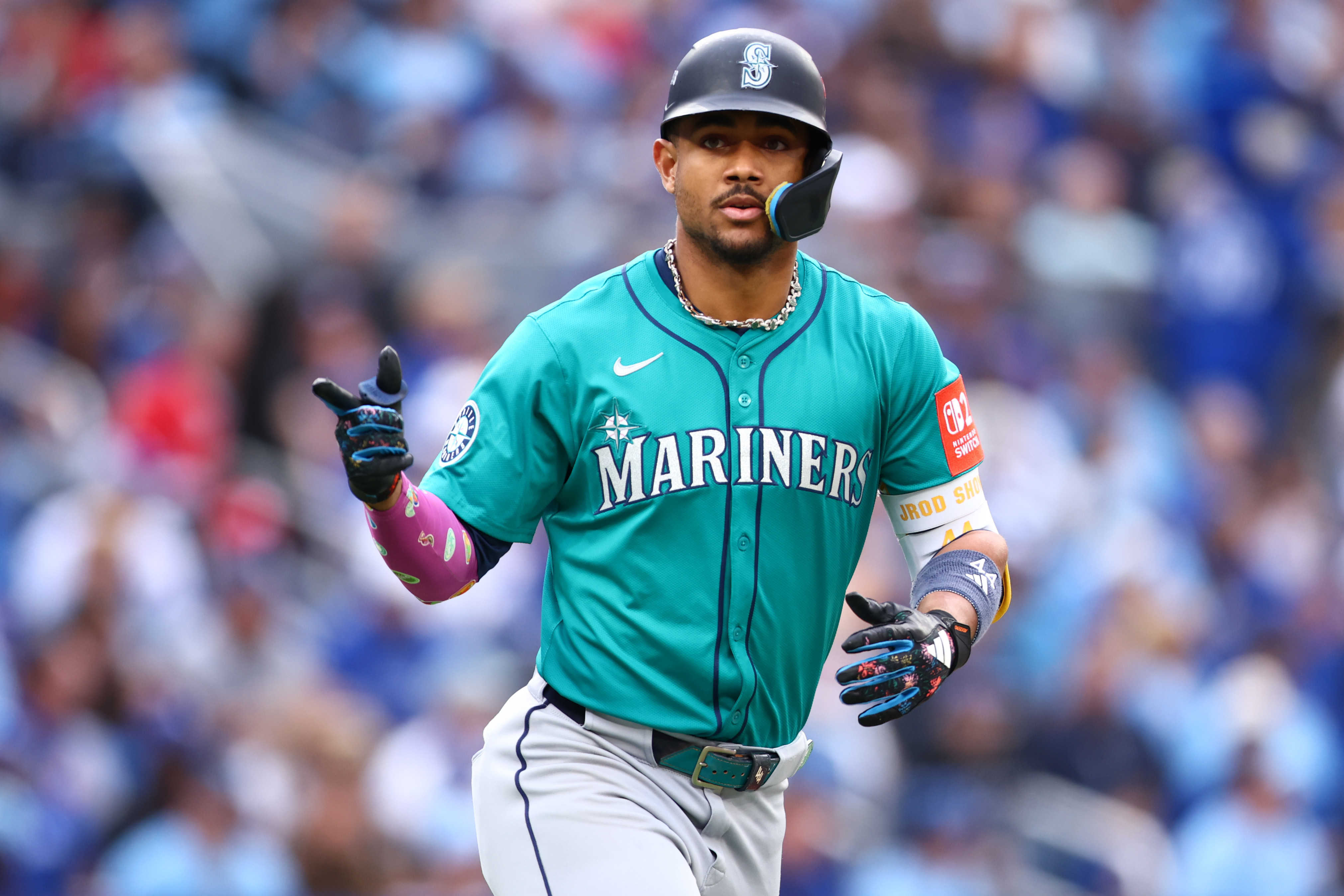 Julio Rodriguez celebrates after hitting a home run against the Toronto Blue Jays in the 2025 American League Championship Series. 