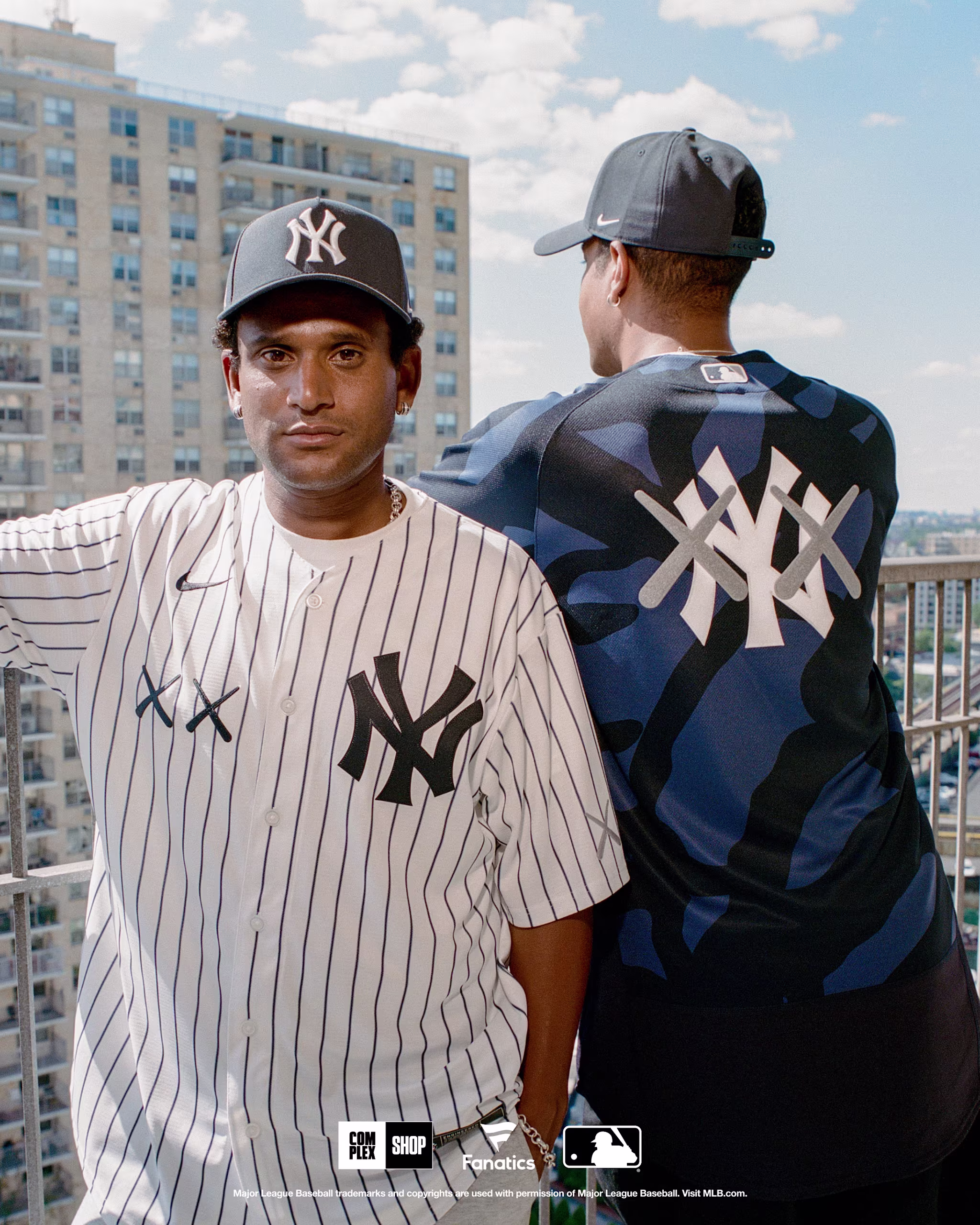 KAWS MLB featured over a balcony with a New York City in the background.