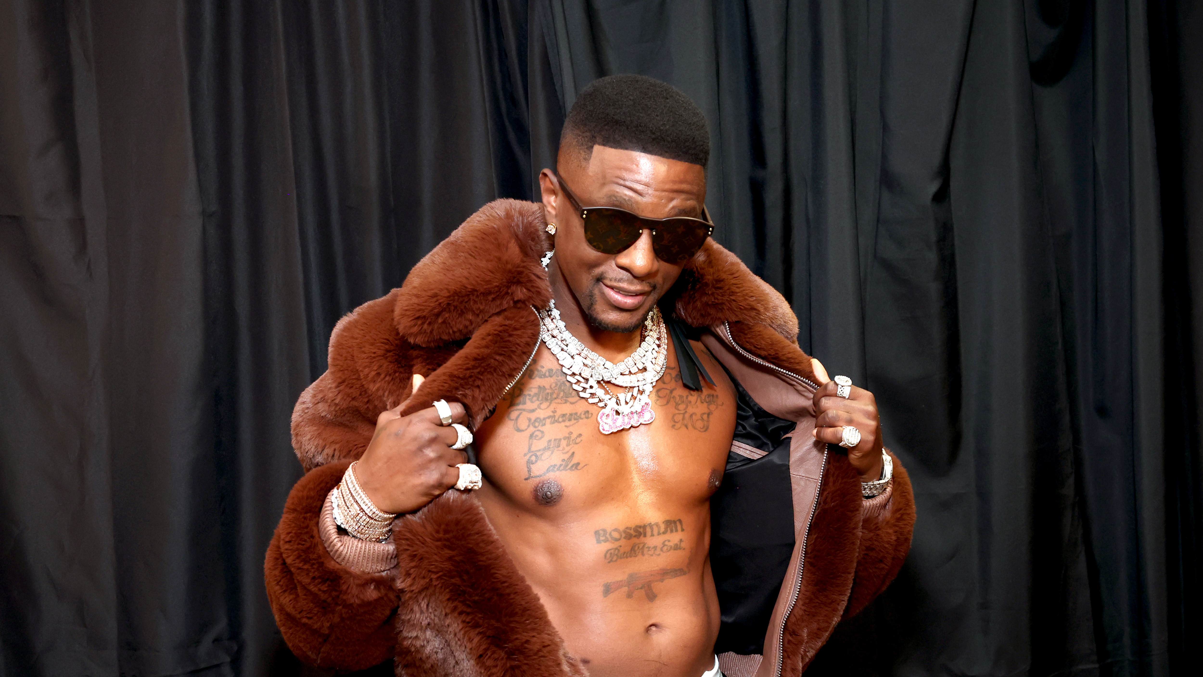 Boosie Badazz, in a fur jacket, appears at the GRAMMY Salute to 50 Years of Hip-Hop.