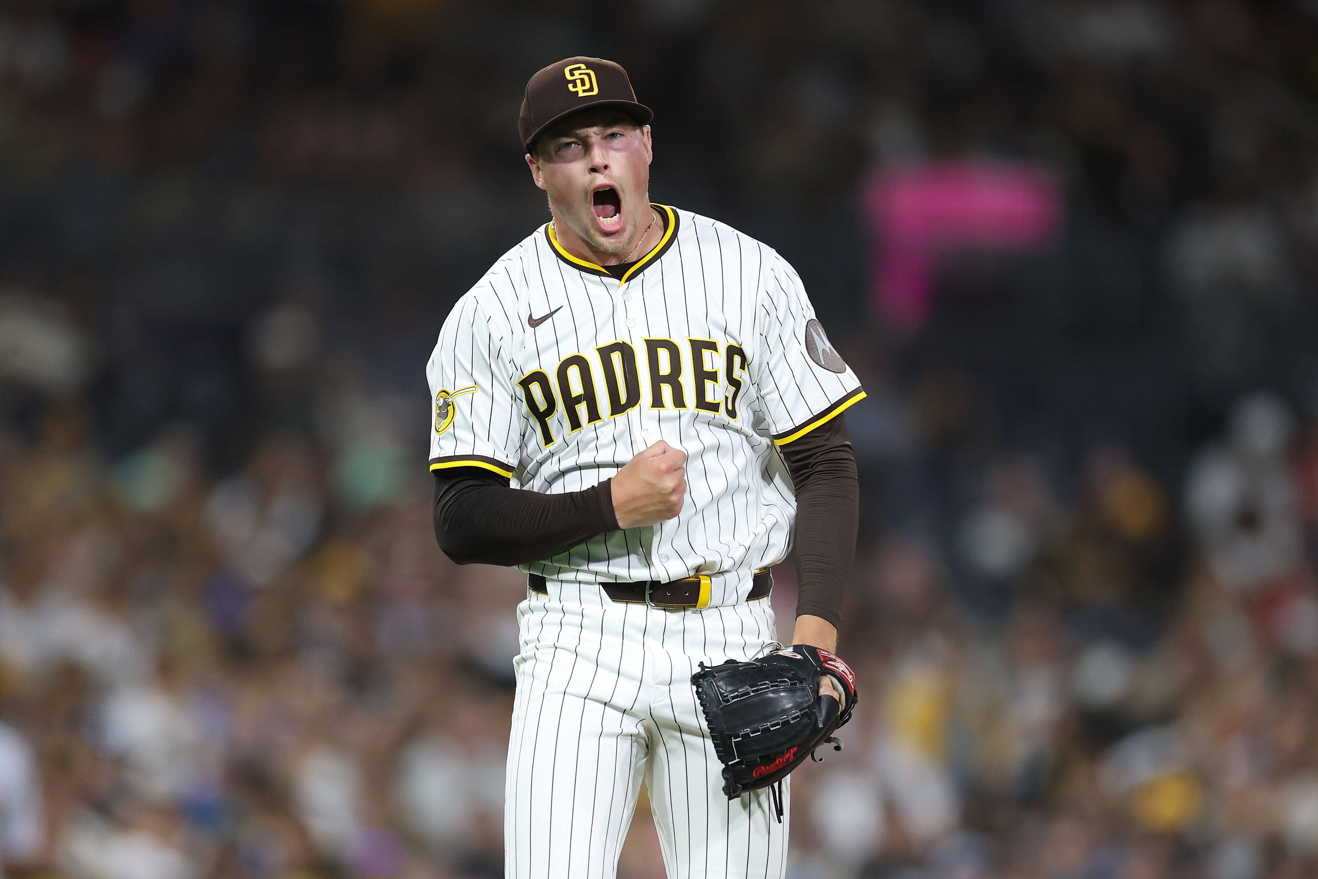 Mason Miller celebrates after saving a game against the Cincinnati Reds in September 2025. 