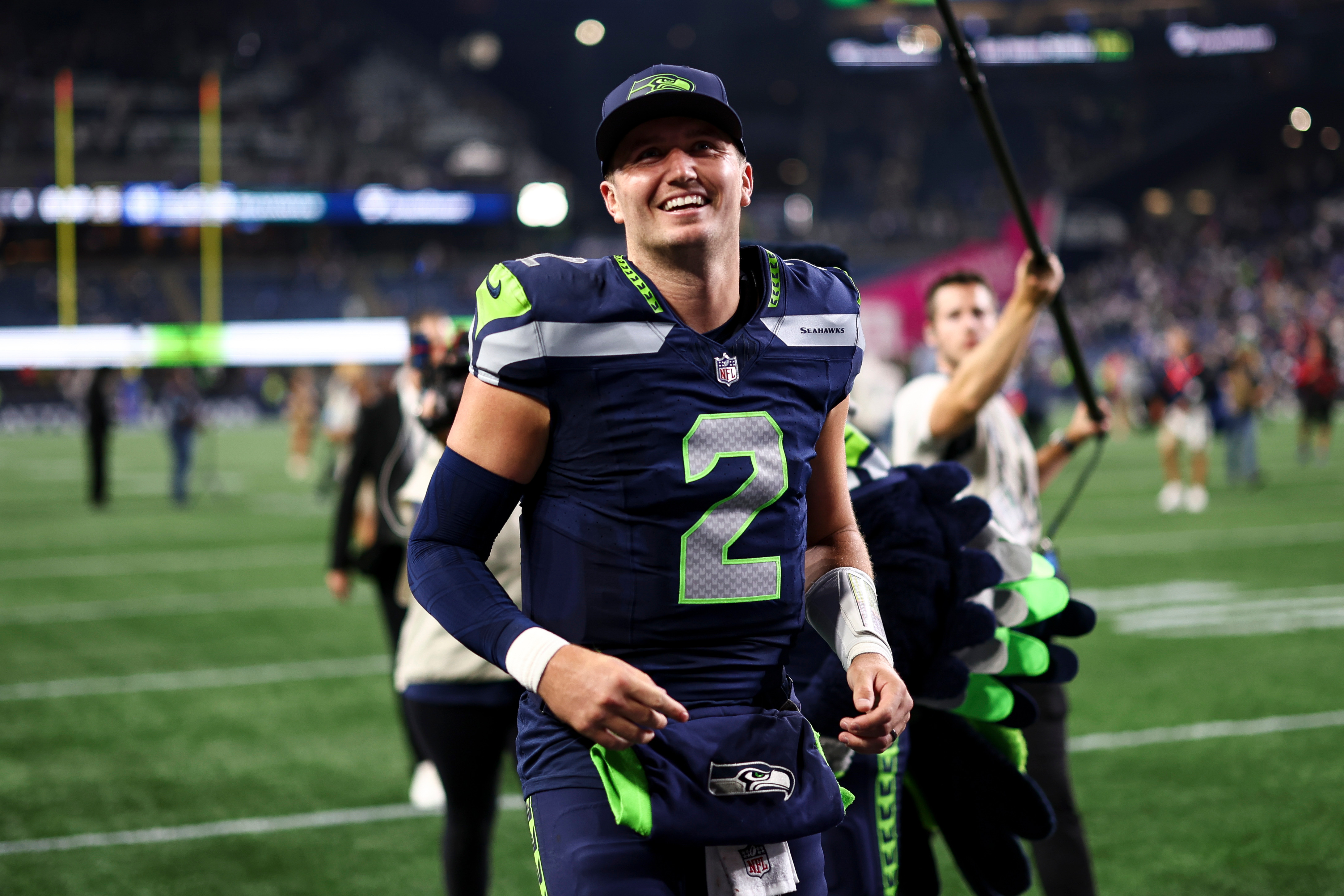 Drew Lock runs off the field after the Seattle Seahawks season opening win over the New England Patriots. 