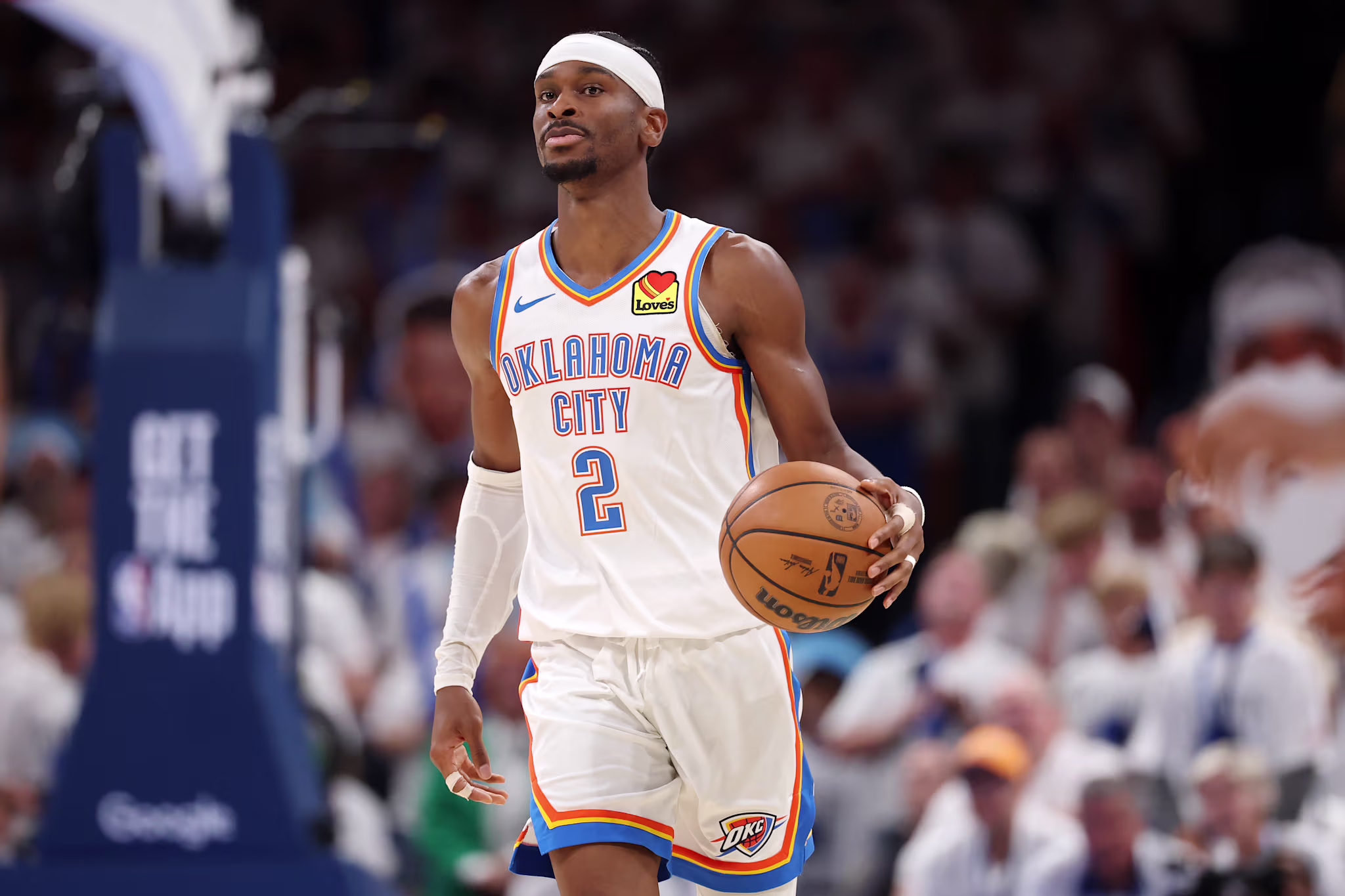 Shai Gilgeous-Alexander dribbles the ball up the floor during a Oklahoma City Thunder-San Antonio Spurs game in May 2026. 
