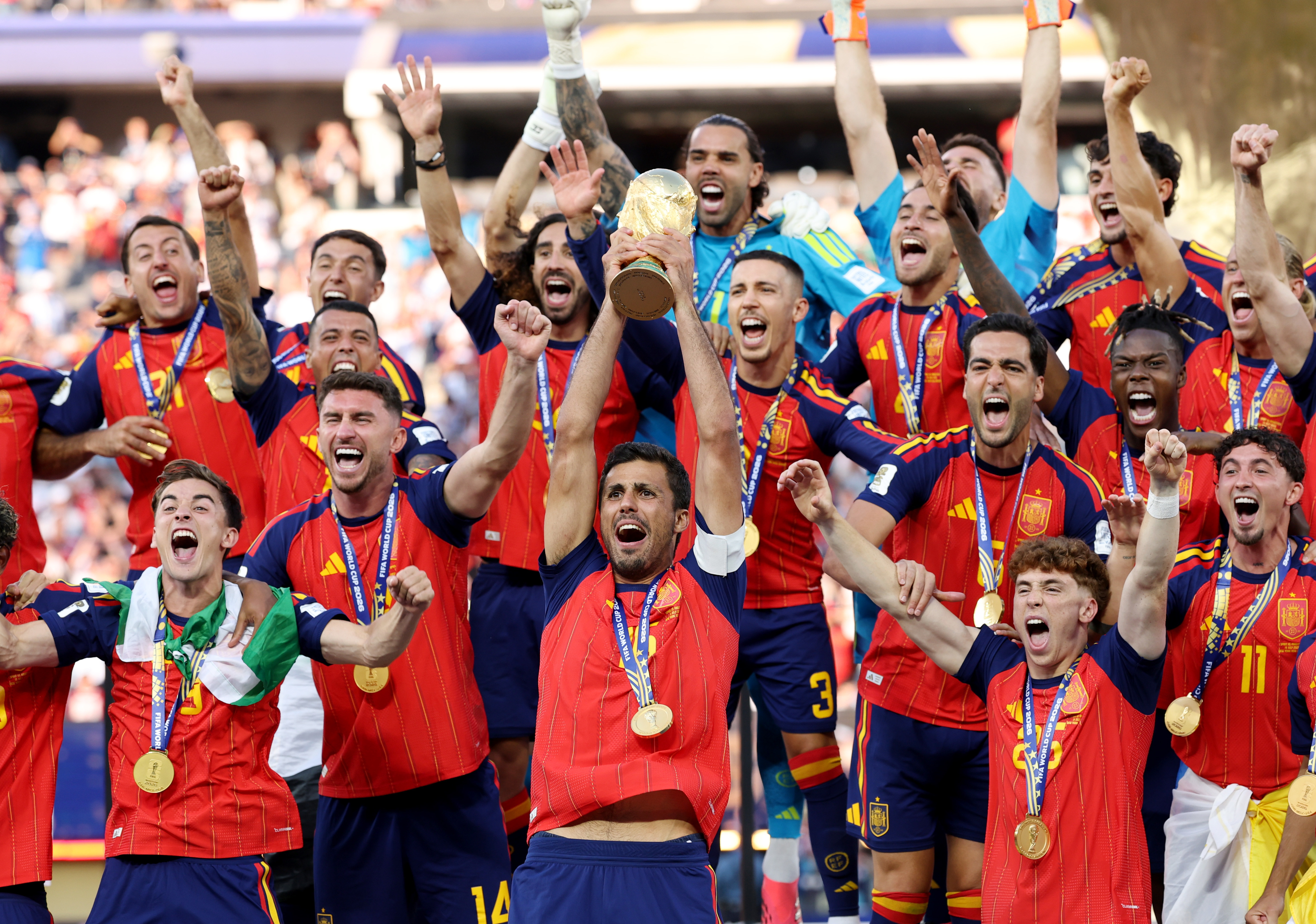 Rodri lifts the World Cup trophy after Spain's 1-0 victory over Argentina in the finals of the 2026 FIFA World Cup. 